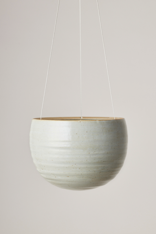 Spherical Hanging Planter
Grey Crackle by Angus & Celeste hanging empty against a white wall.