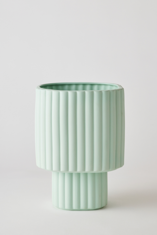 A Mint Modular Stack Planter by Angus & Celeste shown empty and against a white wall.