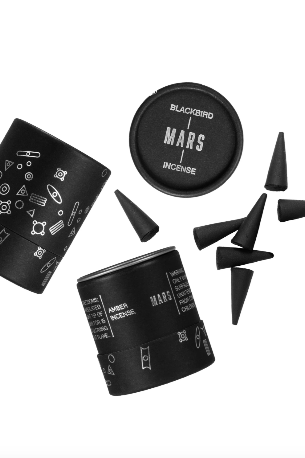 Blackbird Mars incense showing all its parts on a white background