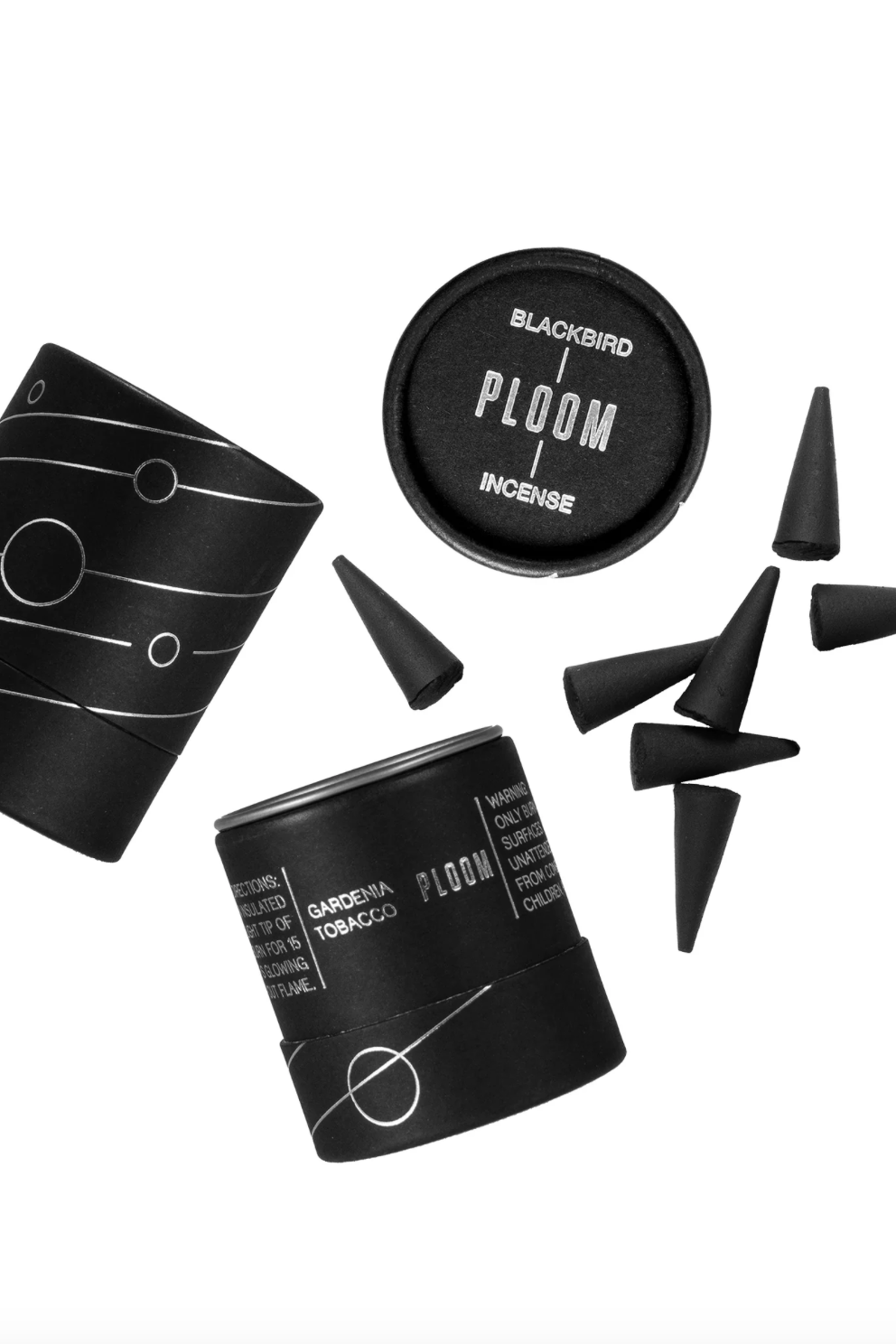 Ploom incense by Blackbird shown open and its parts displayed on top of a white background.