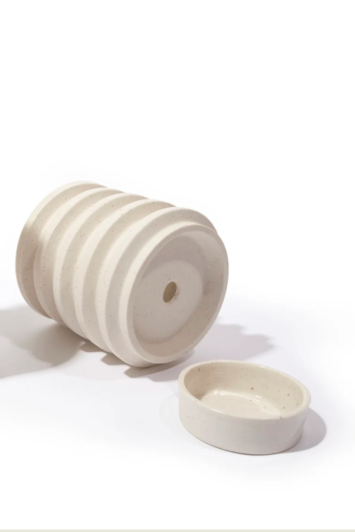 Ceramic container with lid and small bowl on a white background ©Andrew Molleur Studio