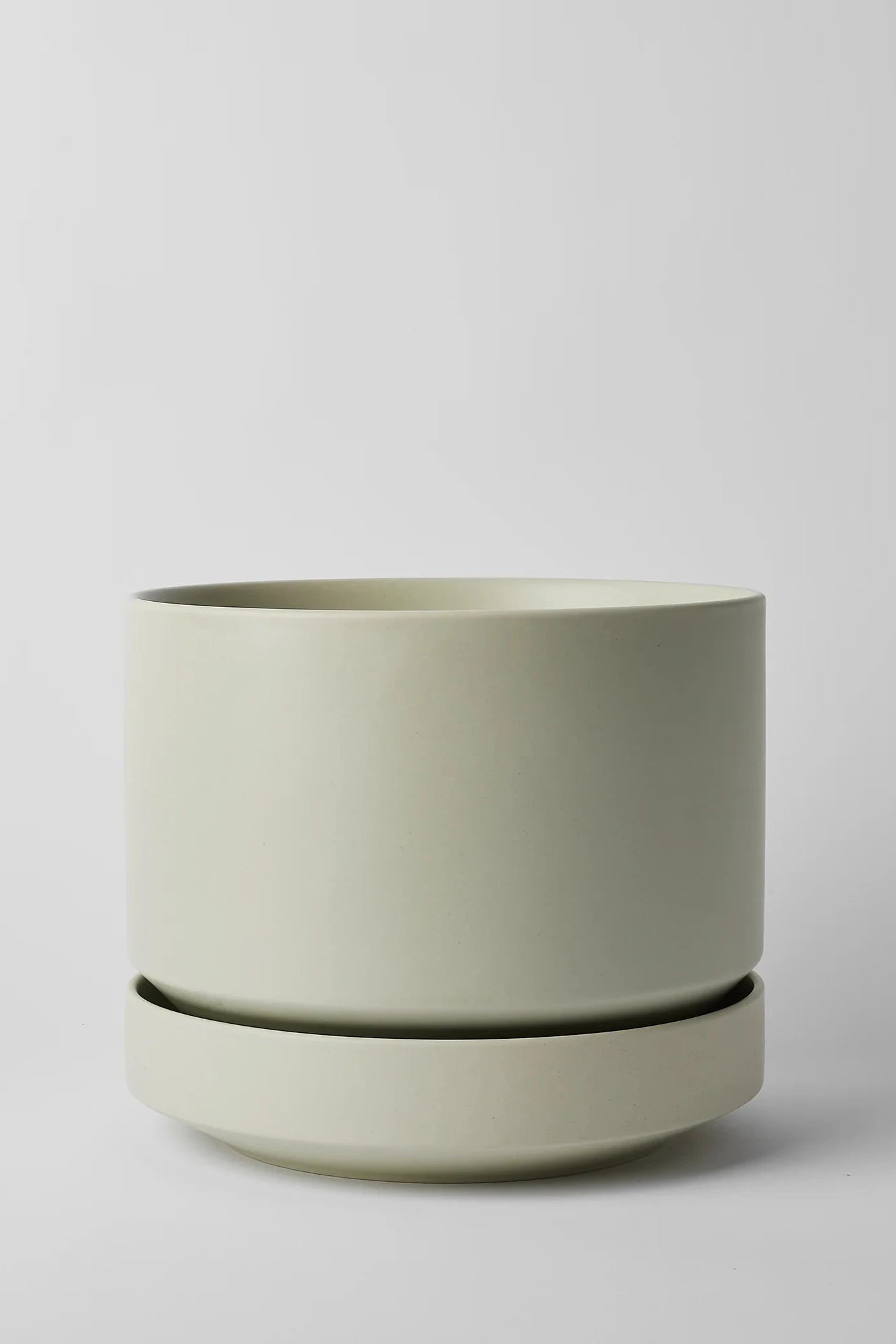 LBE Design Mind Round Two planter against a white wall.