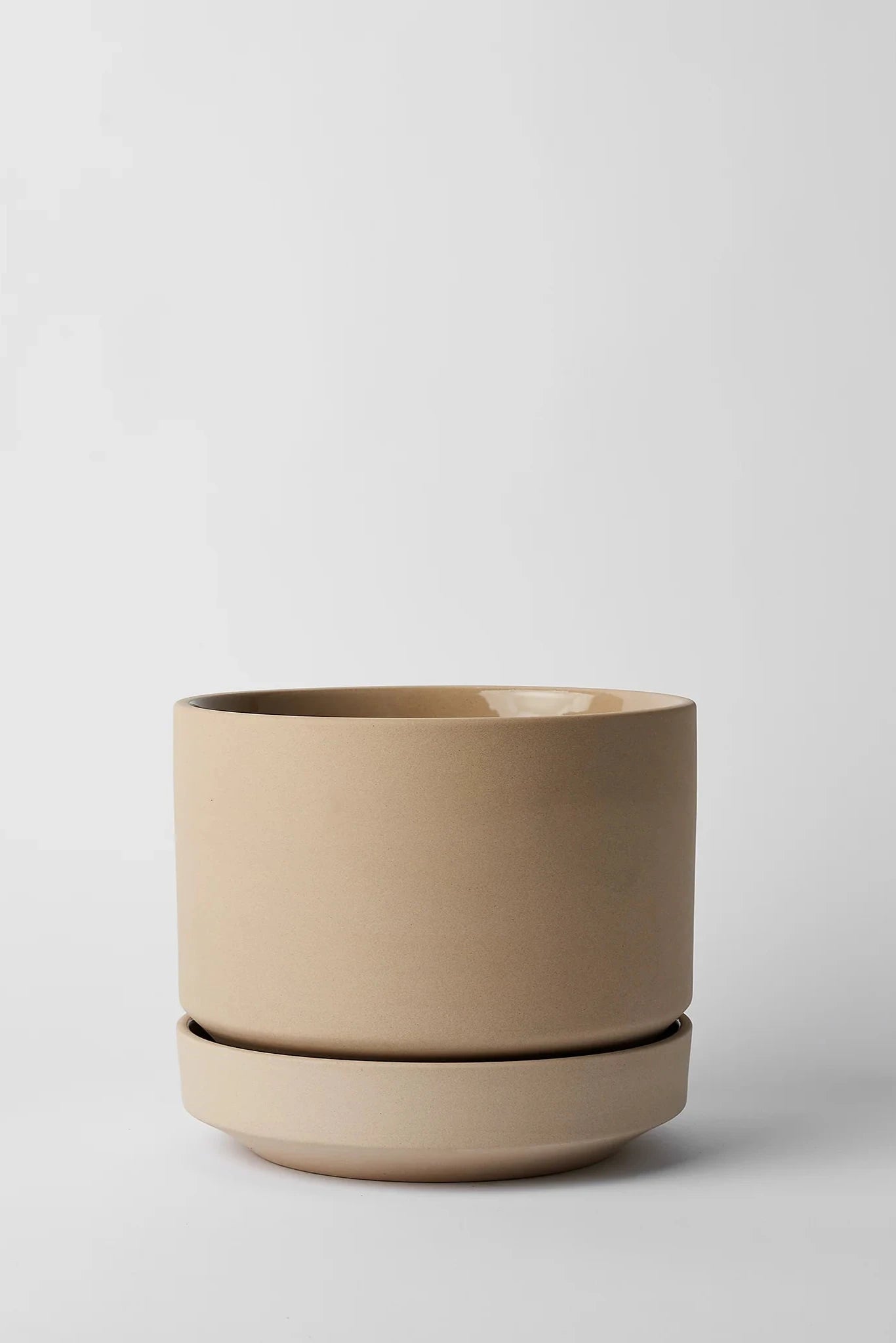 LBE Design Revival Ceramics Oatmeal Round Two planter empty and viewed from the side.