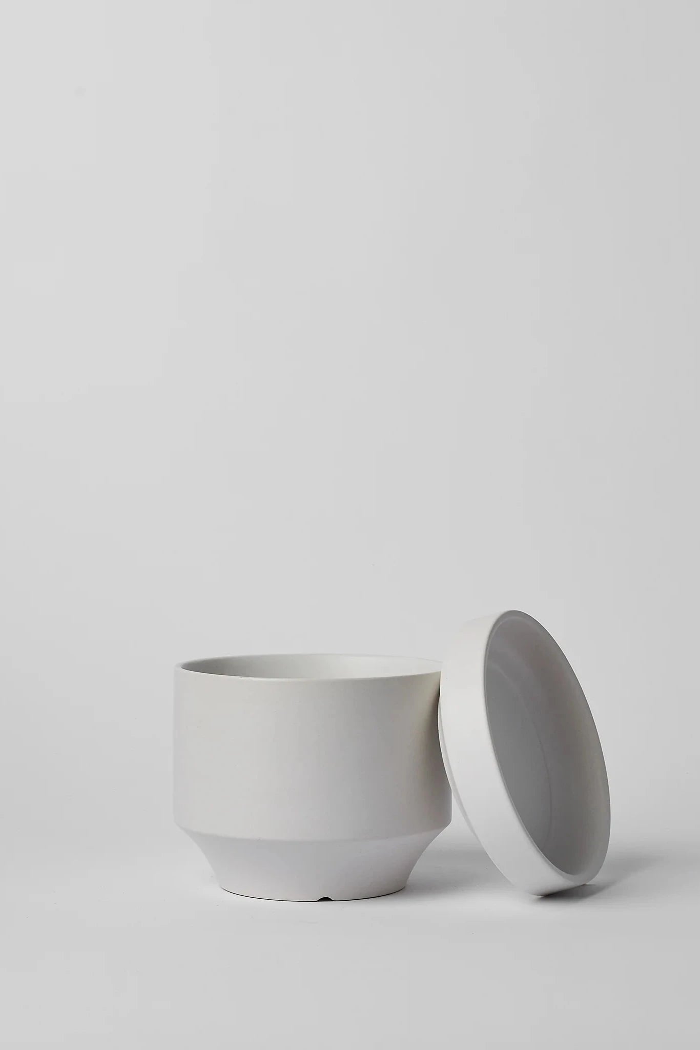 LBE Design Revival Ceramics White Round Two planter showing the two parts separated.