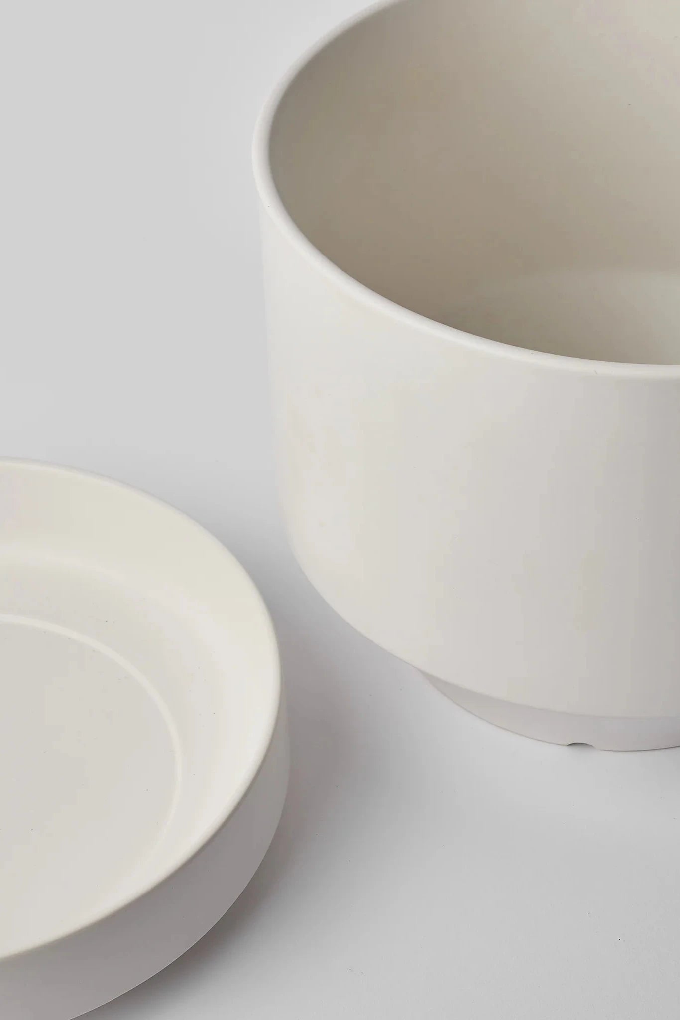 LBE Design Revival Ceramics Round Two Planter in White showing the main planter and the separated saucer