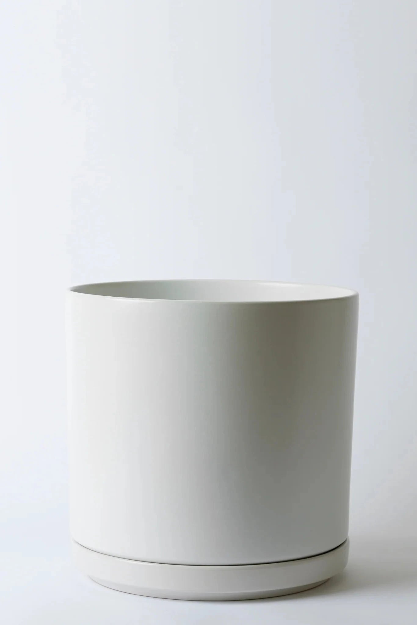LBE Design Solid Goods cylinder and saucer in white