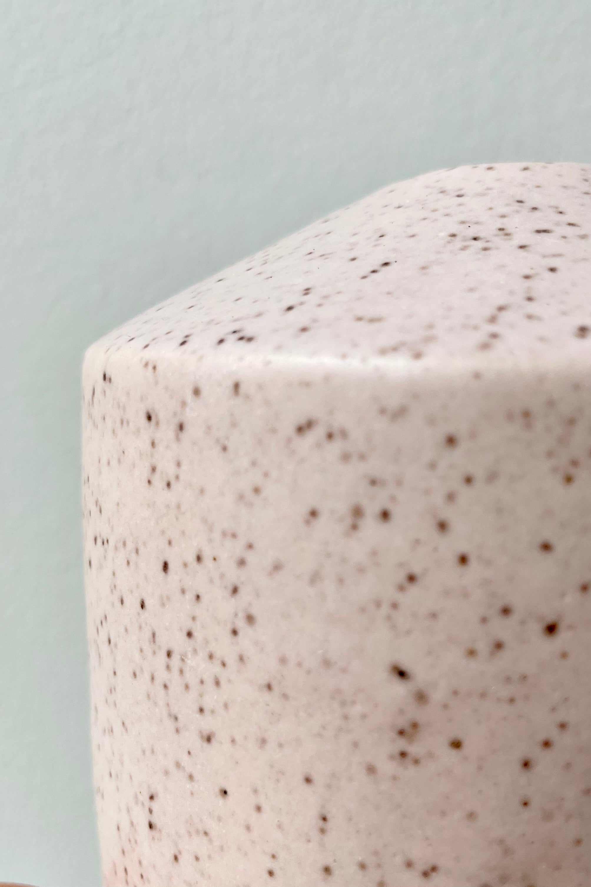 Detail up close shot showing the glaze color and speckle of the Pink Speckle Siros Vase.