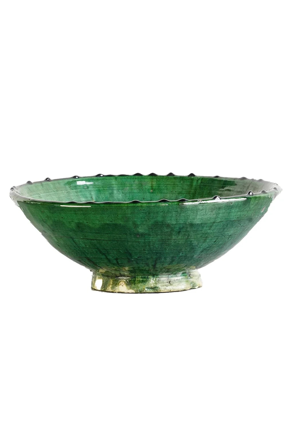a green Tamegroute bowl shown from the side and on a white background. ©Blue Ocean Traders