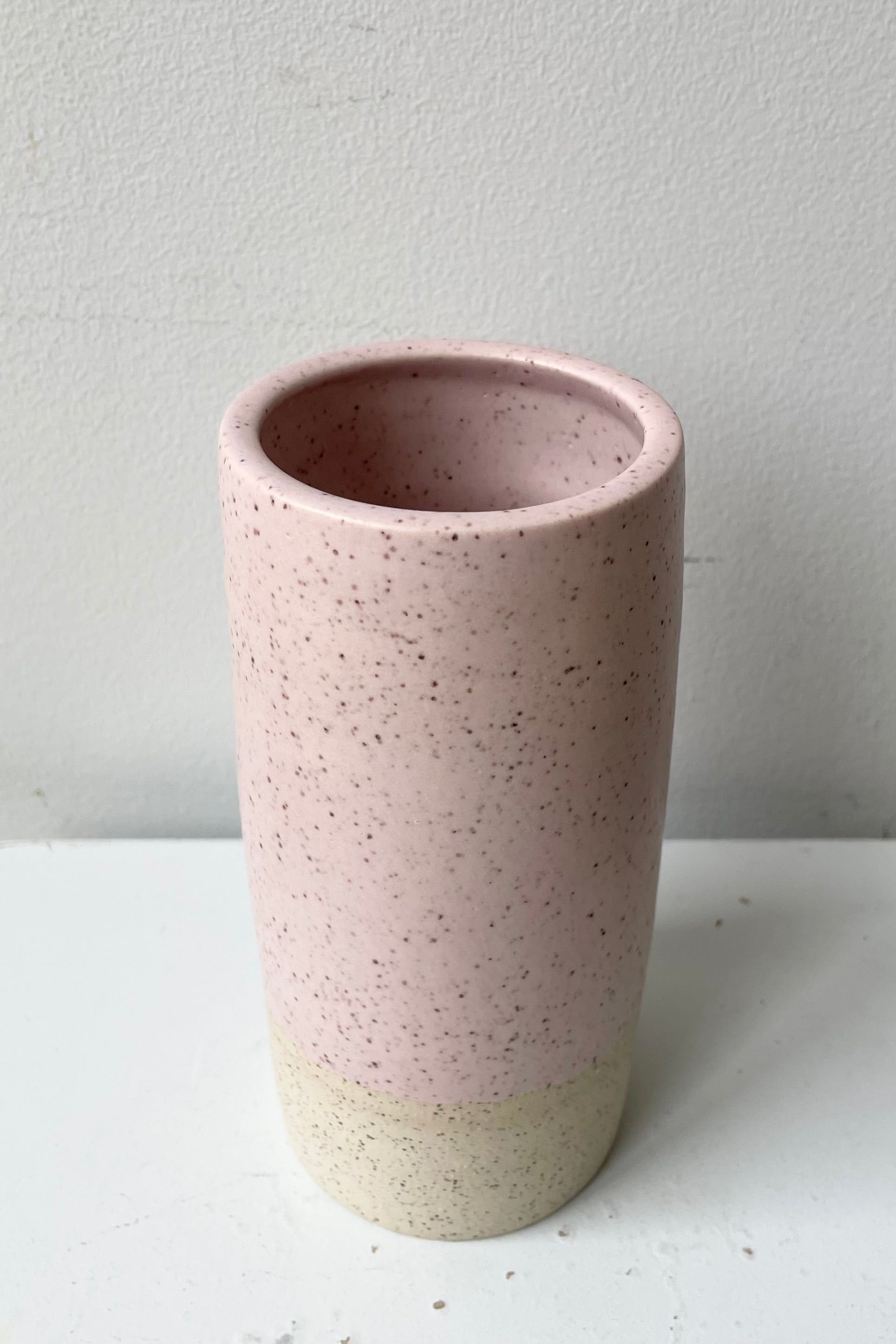 Jacqueline vase in pink speckle looking from above and to the side looking in.