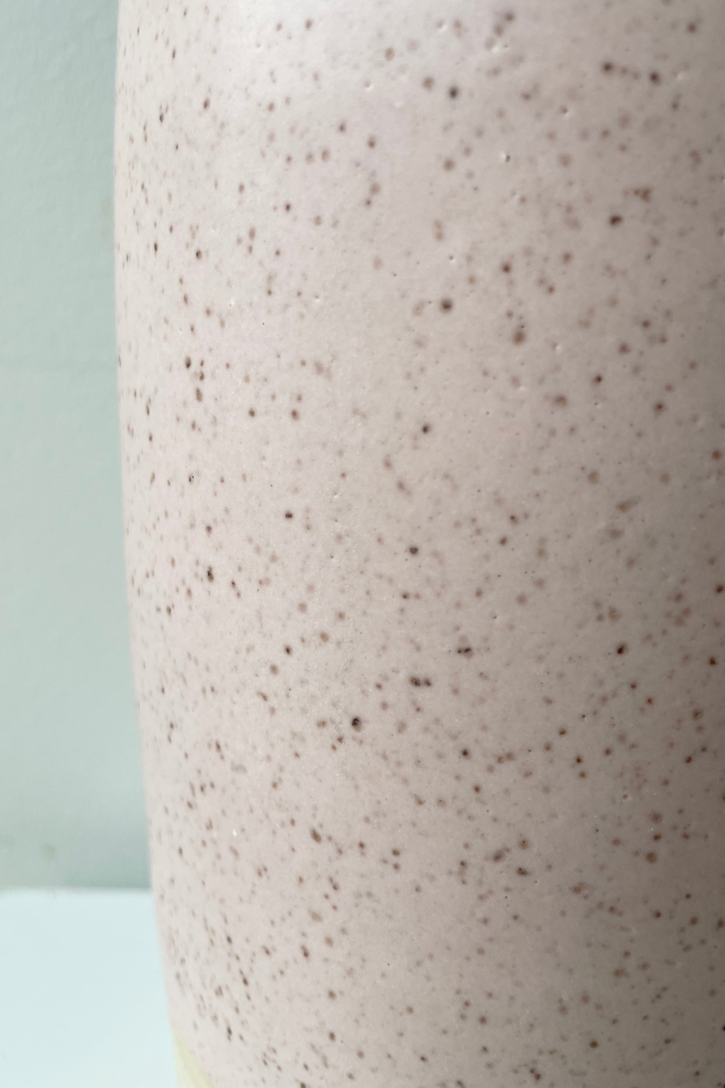 Detail of the glaze color and patterning of the Jacqueline vase in pink speckle.