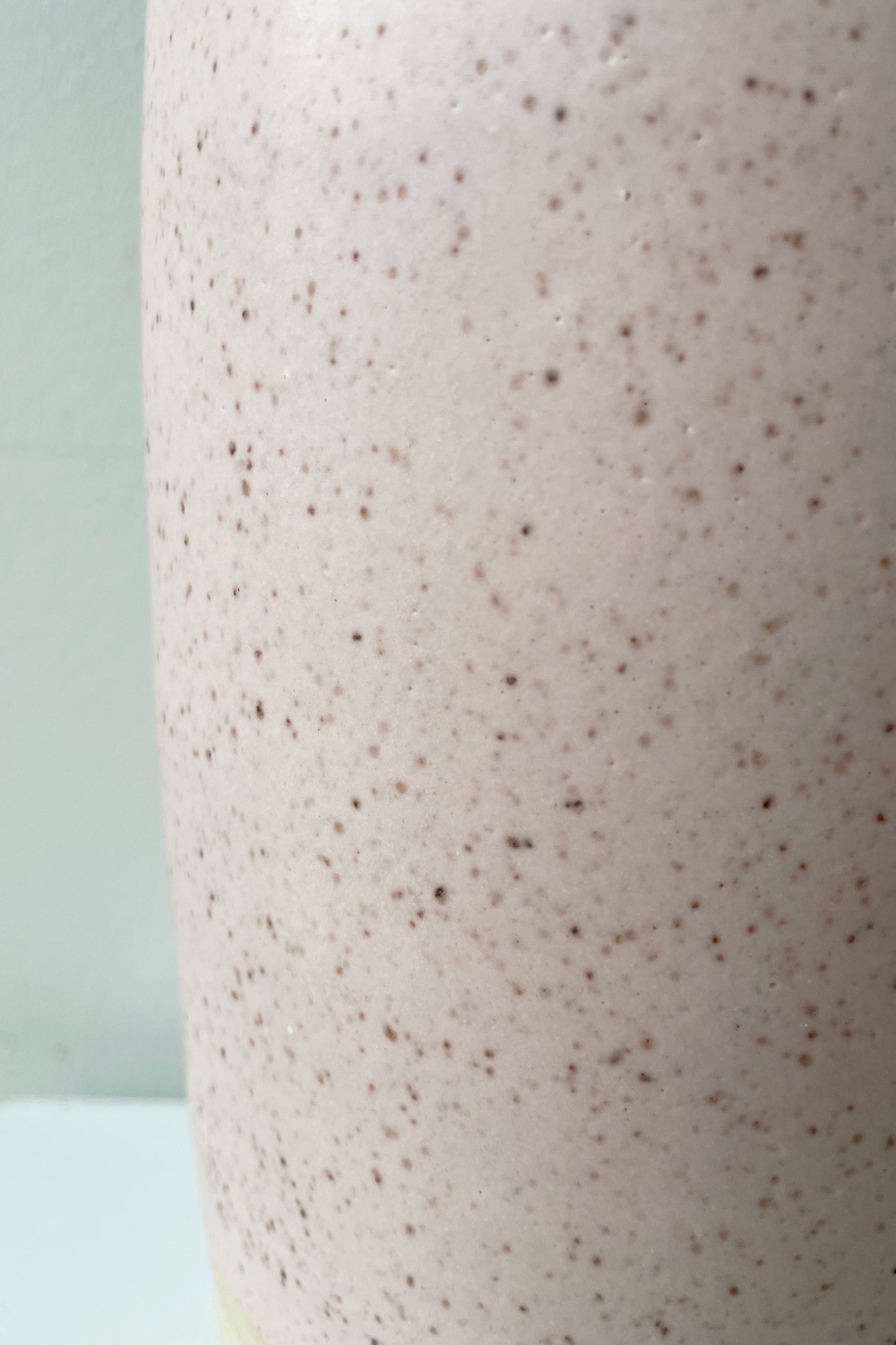 Detail of the glaze color and patterning of the Jacqueline vase in pink speckle. ©Sprout Home