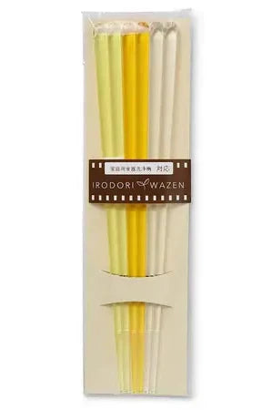 The set of three Yellow gradient acrylic chopstick and their packaging.