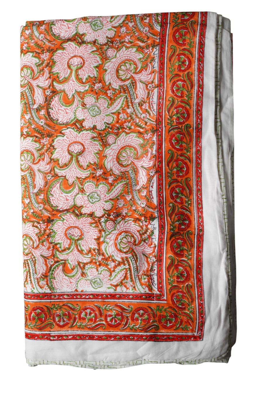Colorful fabric with intricate orange and cream patterns and designs on a reversible blanket ©Annahmol