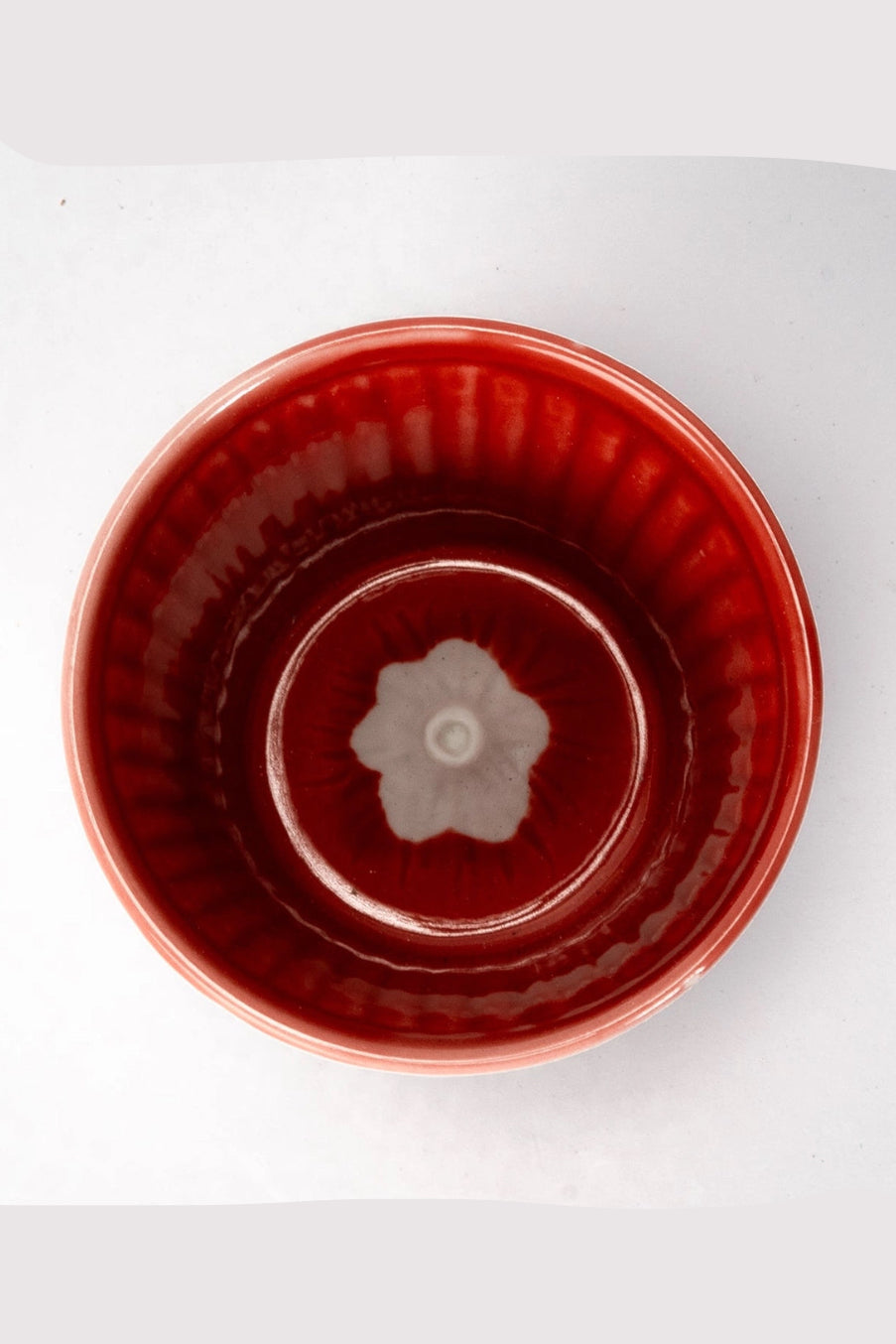 Red ceramic Fuji Sakura cup on a white background ©Urban Tokyo