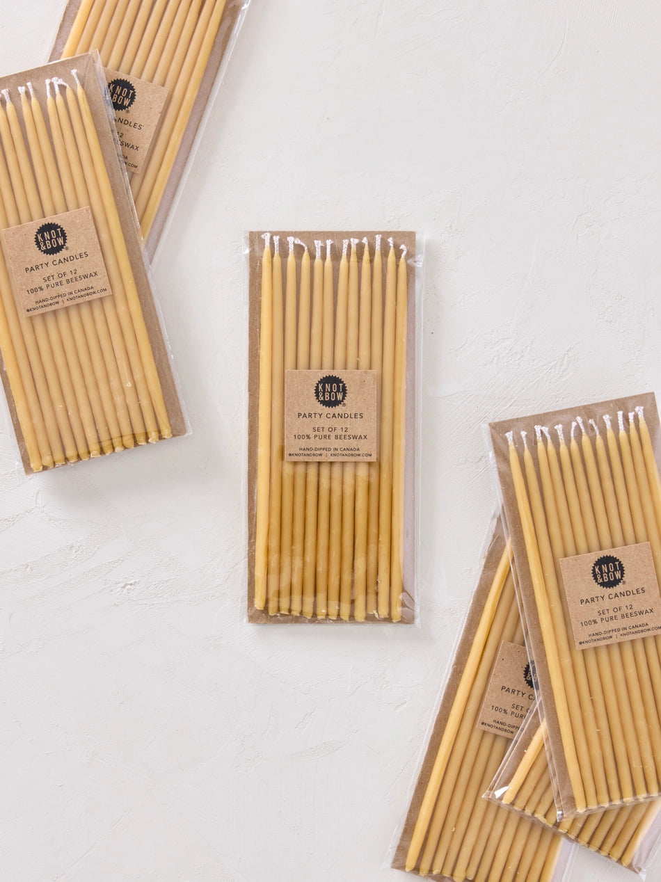 Knot & Bow Tall Natural beeswax candles multiple packs laying flat