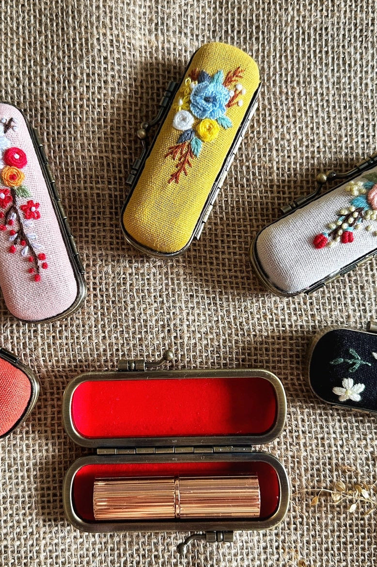 Yellow hand embroirdered lipstick case in yellow ©Quince Fables