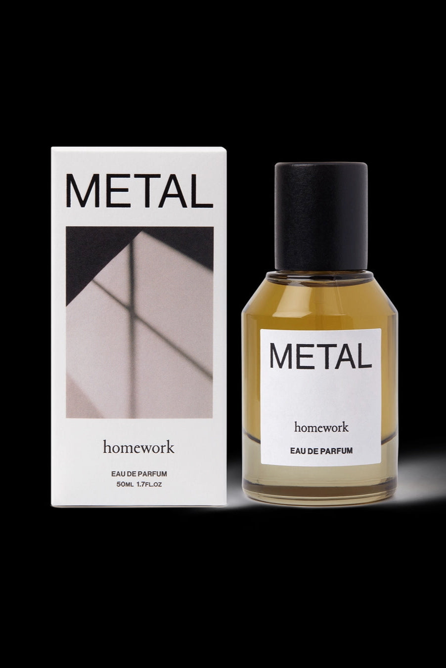 Metal Eau de Parfum Bottle and box of 'Metal' homework Eau de Parfum on a black background ©Homework