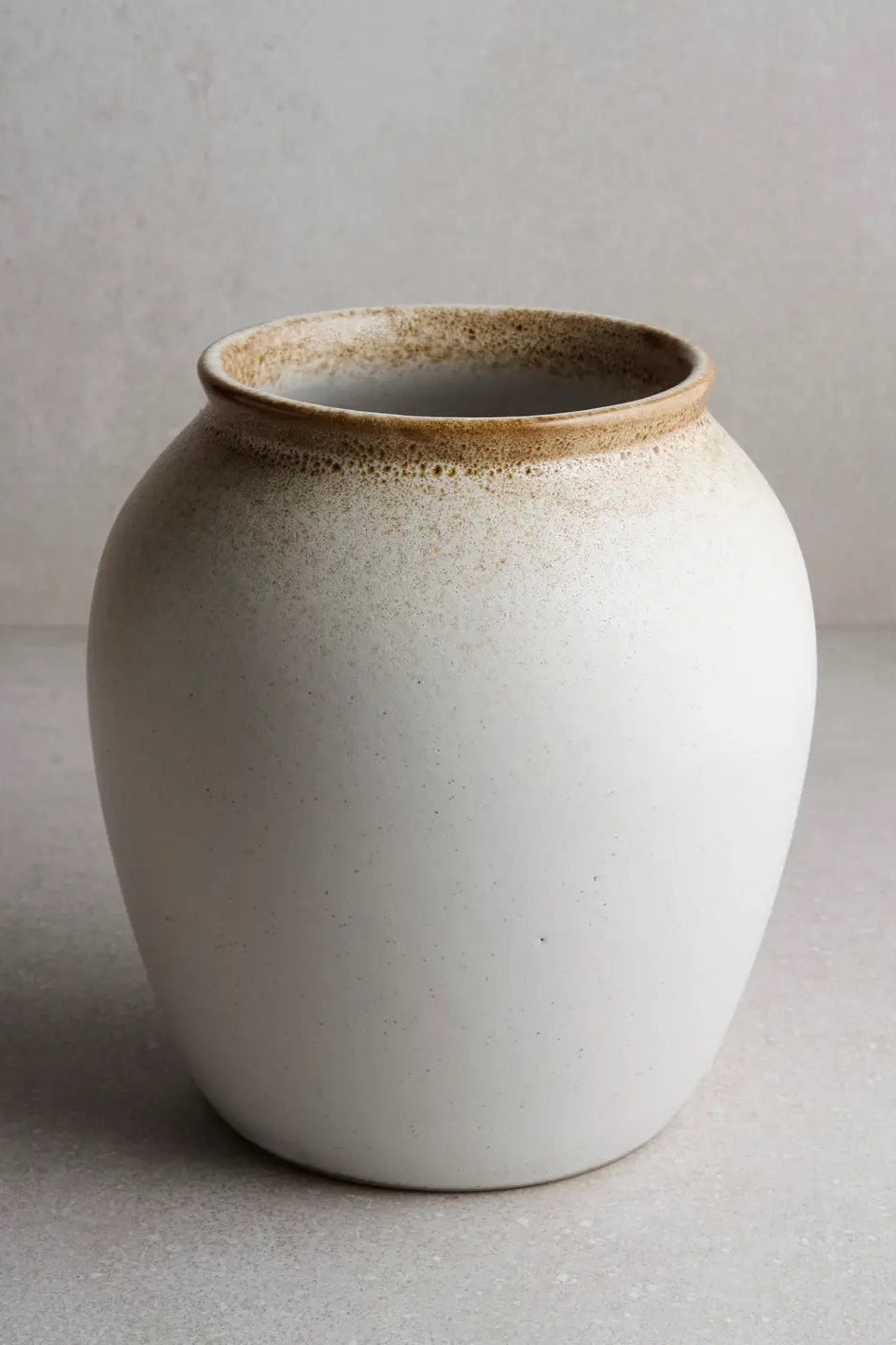 Classic Large ceramic vase with brown accents on a light gray background ©Goodies