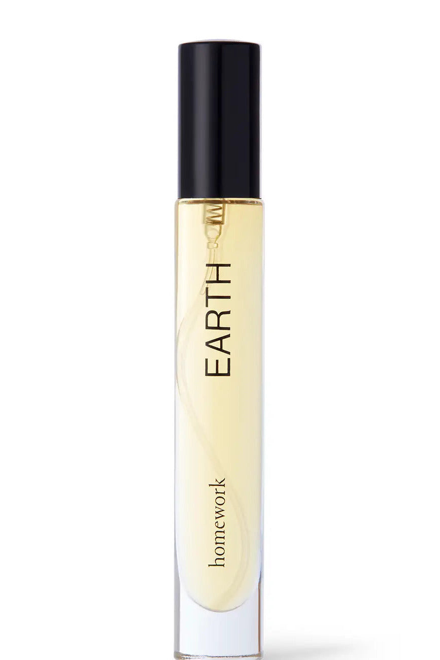 Roll-on bottle labeled 'homework EARTH' on a white background ©Homework
