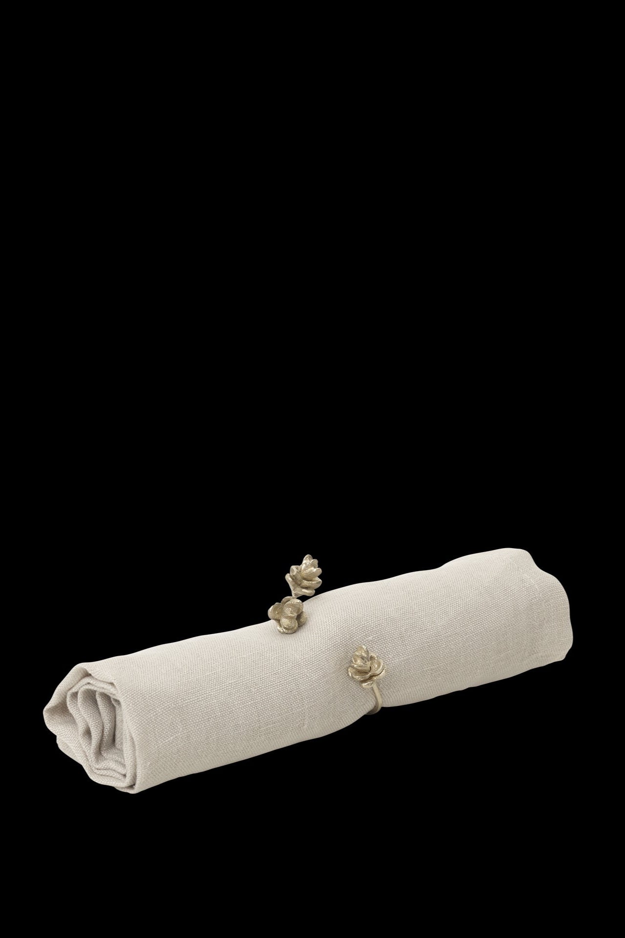 Forest Napkin Ring Brass wrapped around a linen napkin©Ferm Living