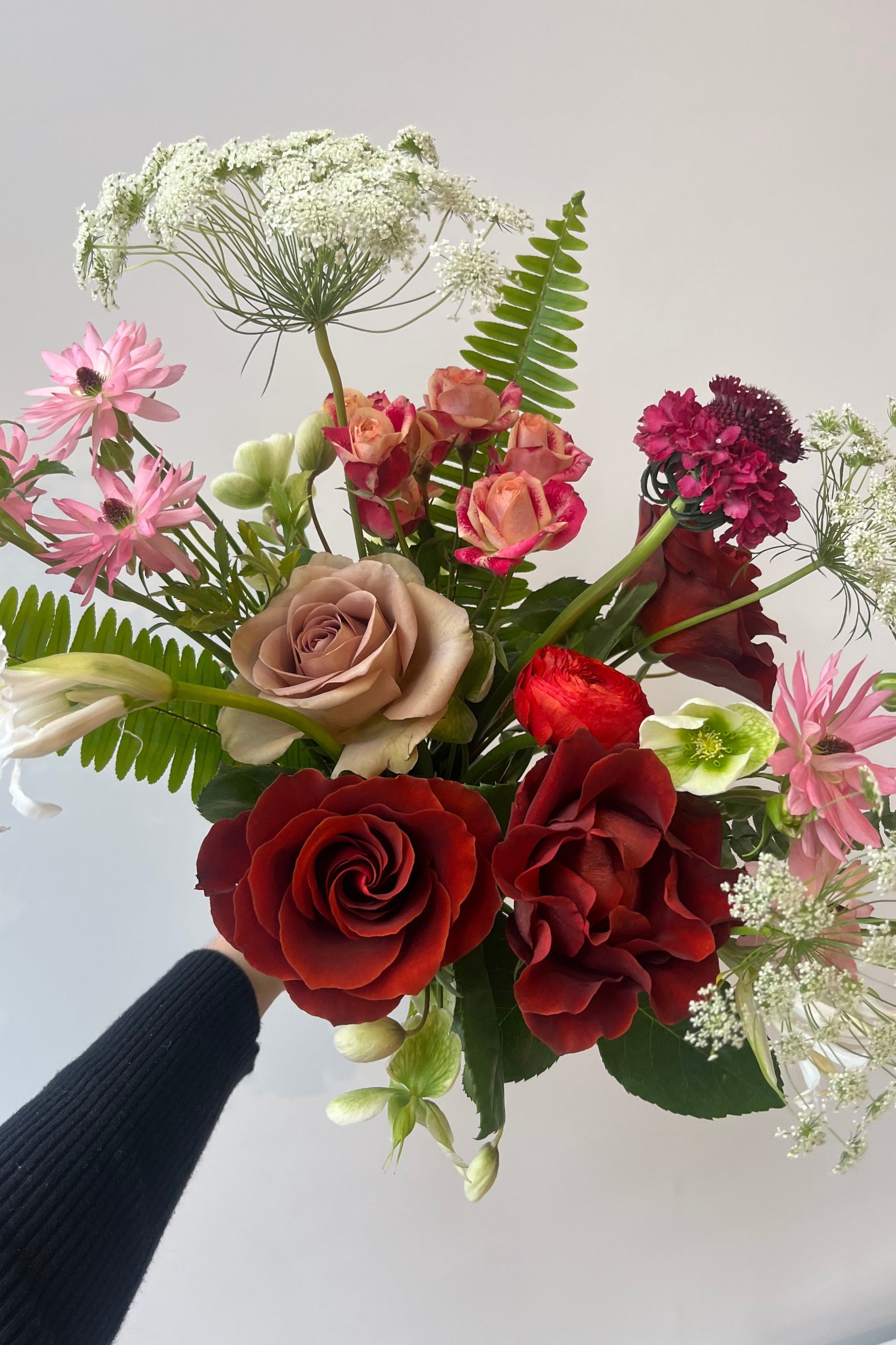 Modern Love custom arrangement from Sprout Home with red garden roses and queens Anne lace @Sprout Home #size_$75