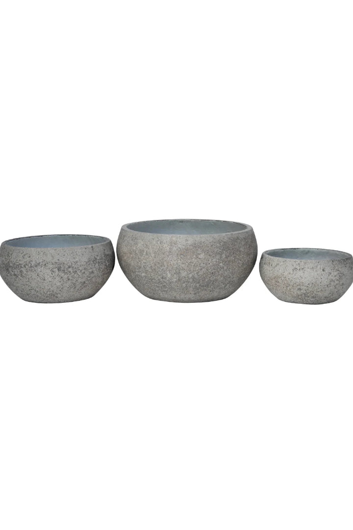 Three gray Greige Ficonstone planters of different sizes on a white background ©Anamese