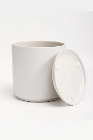 A white planter and saucer on a white background ©LBE Design