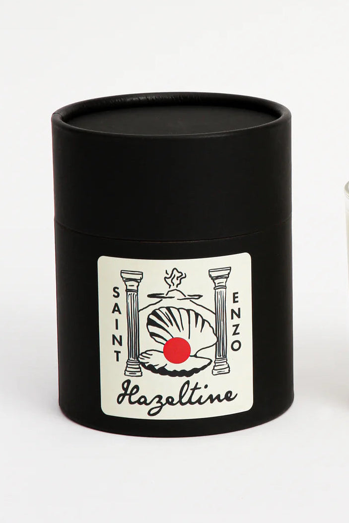 Black cylindrical container with a Saint Enzo label on a white background ©Hazeltine