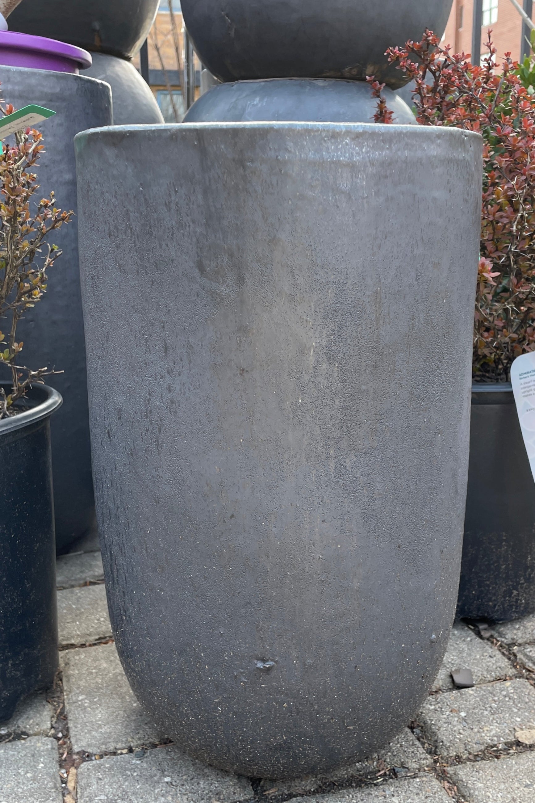 A graphite crucible planter, empty, and viewed from the side. ©Sprout Home