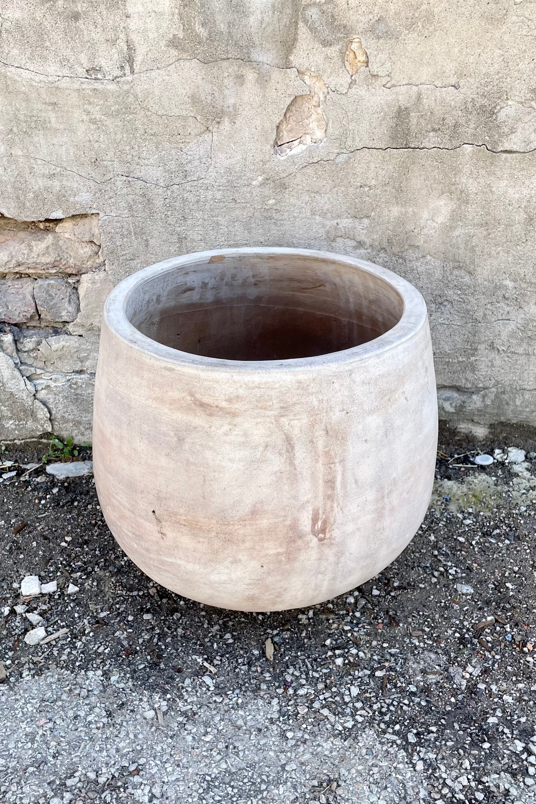Detail of Yumiko Unglazed Planter Large against a grey wall