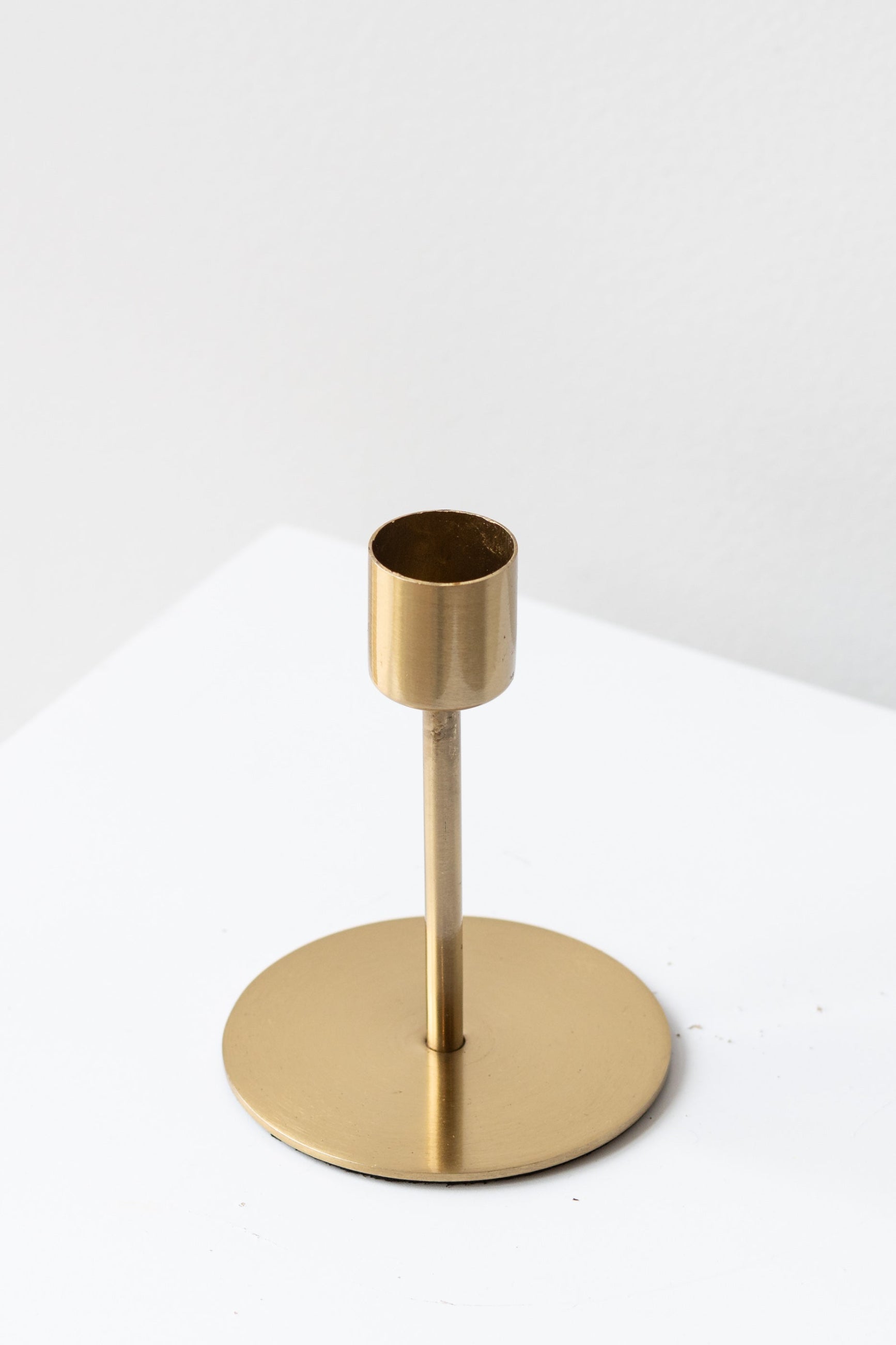 Metal medium Kent gold taper candle holder ©Sprout Home