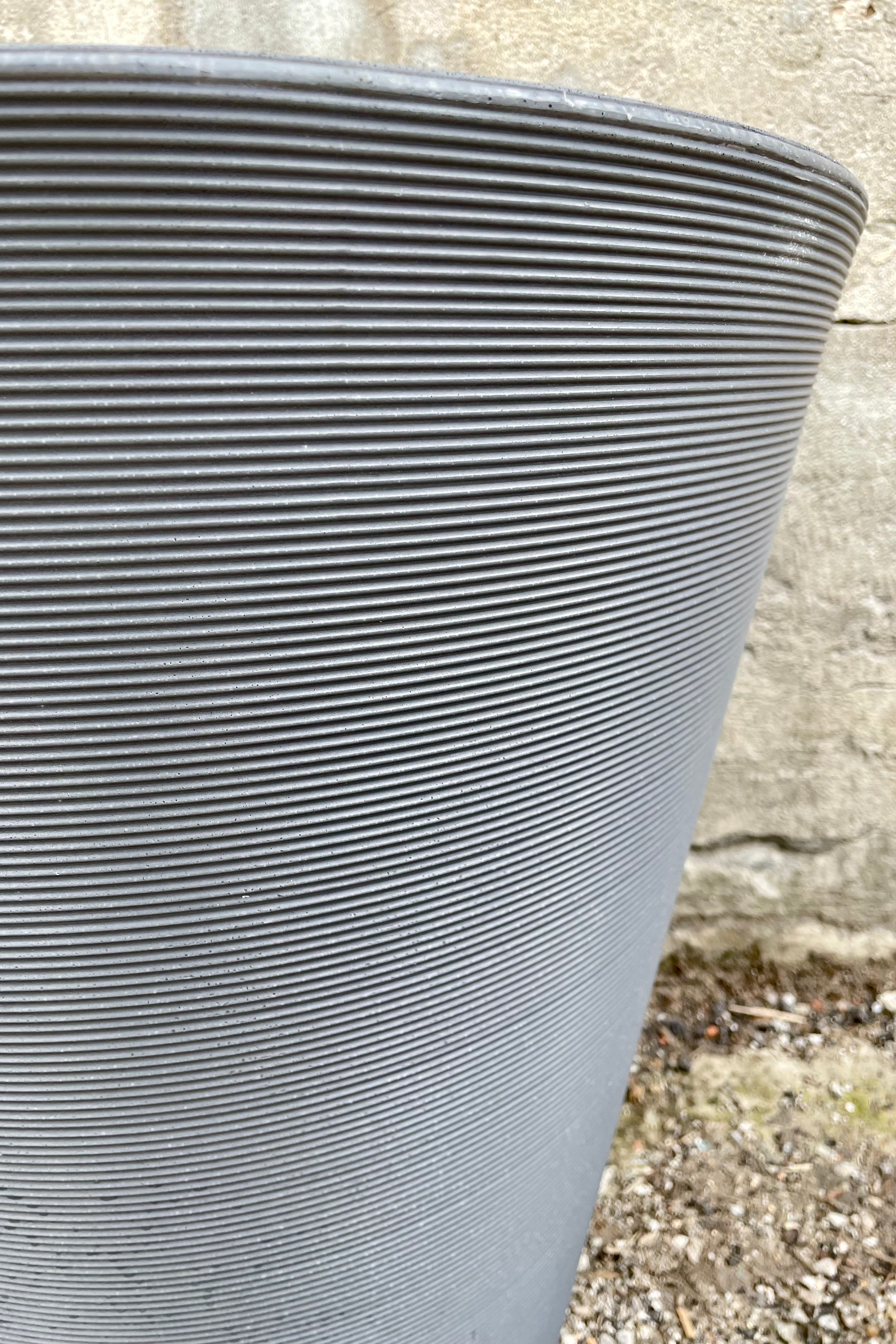 a detailed picture of the horizontal ridges of the slate madison pot.