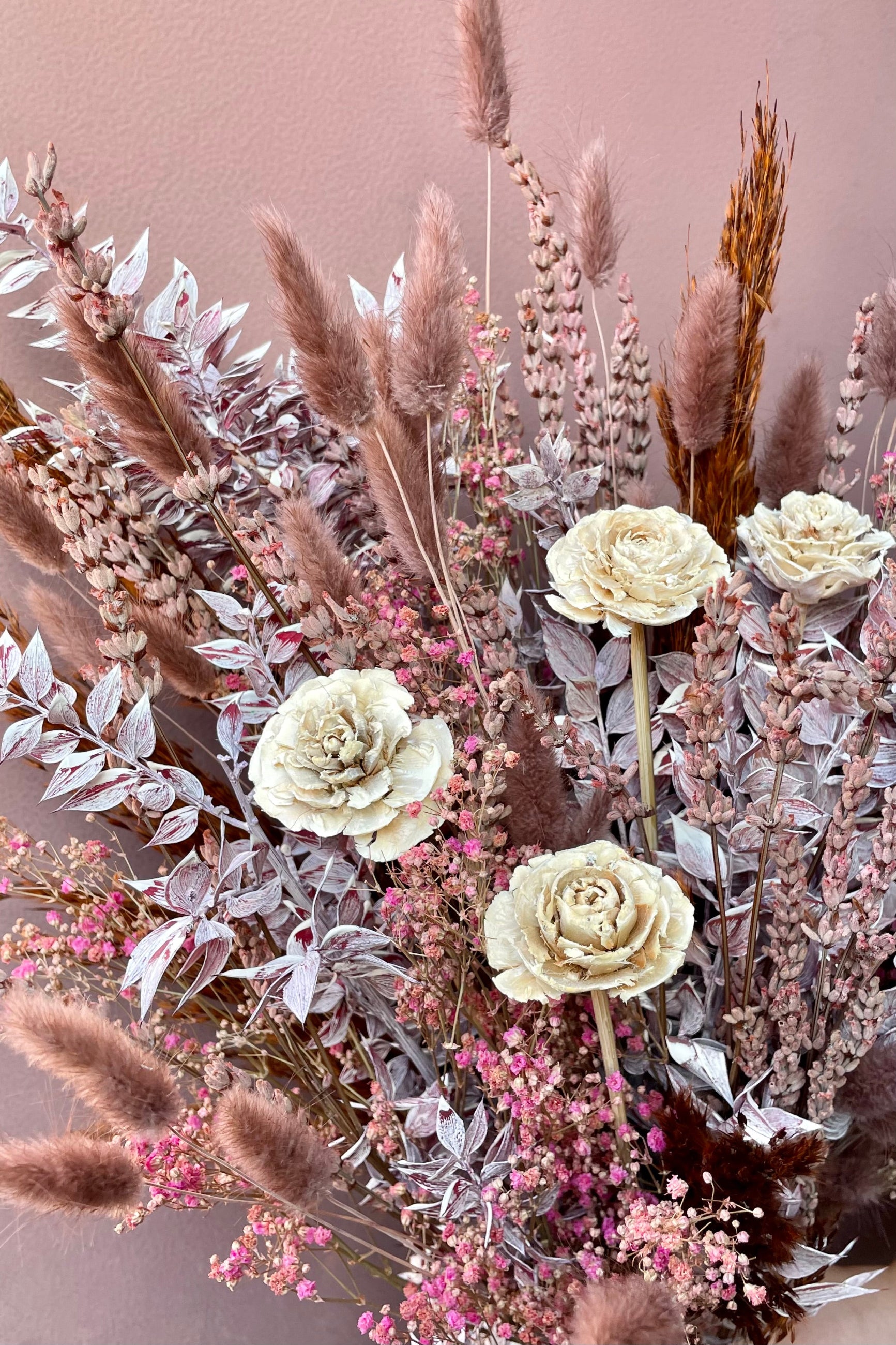 Ambrosia preserved arrangement by Sprout Home detail against a mauve wall. ©Sprout Home #size_$125