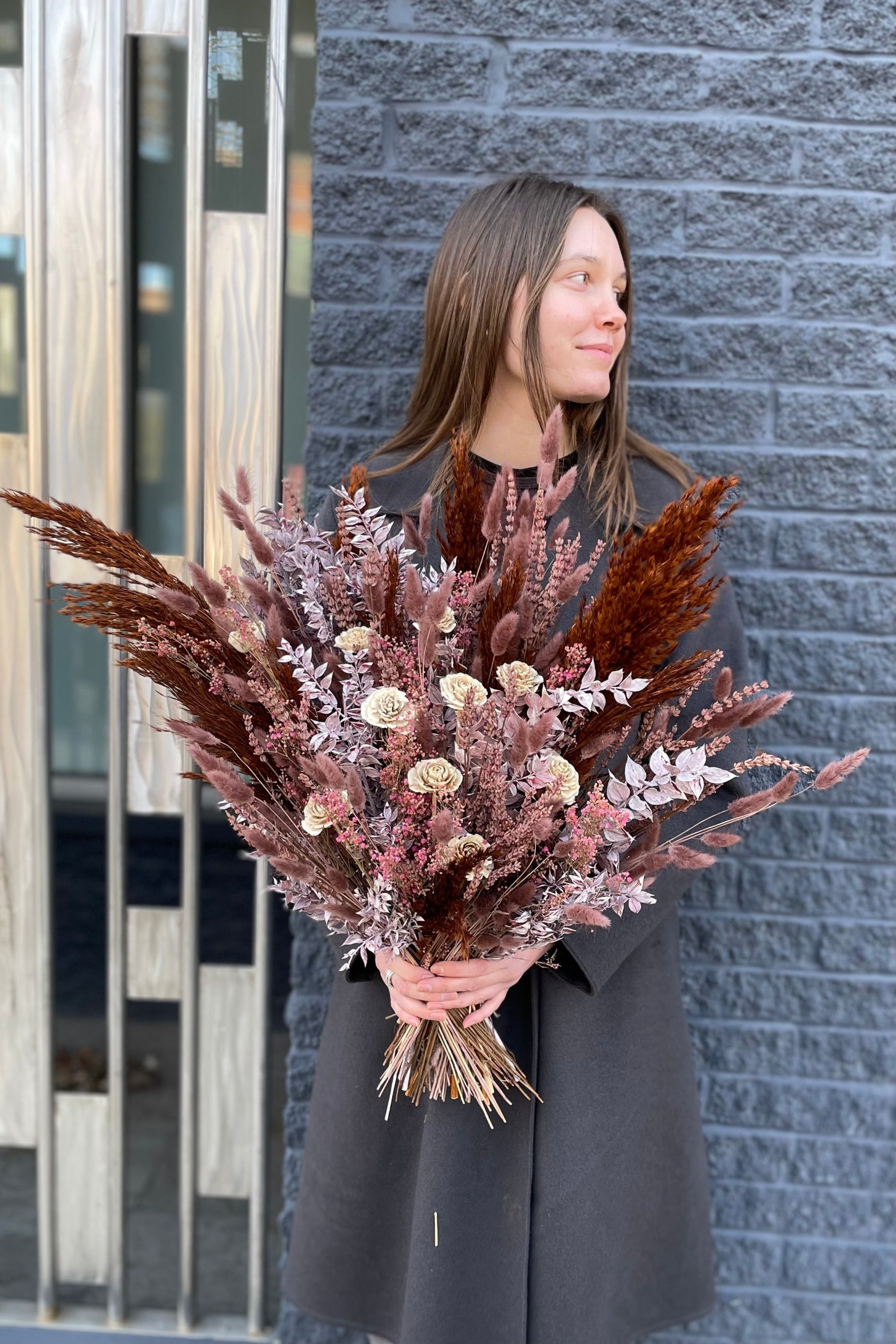 Ambrosia custom preserved arrangement by Sprout Home. Held in hand ©Sprout Home #size_$200