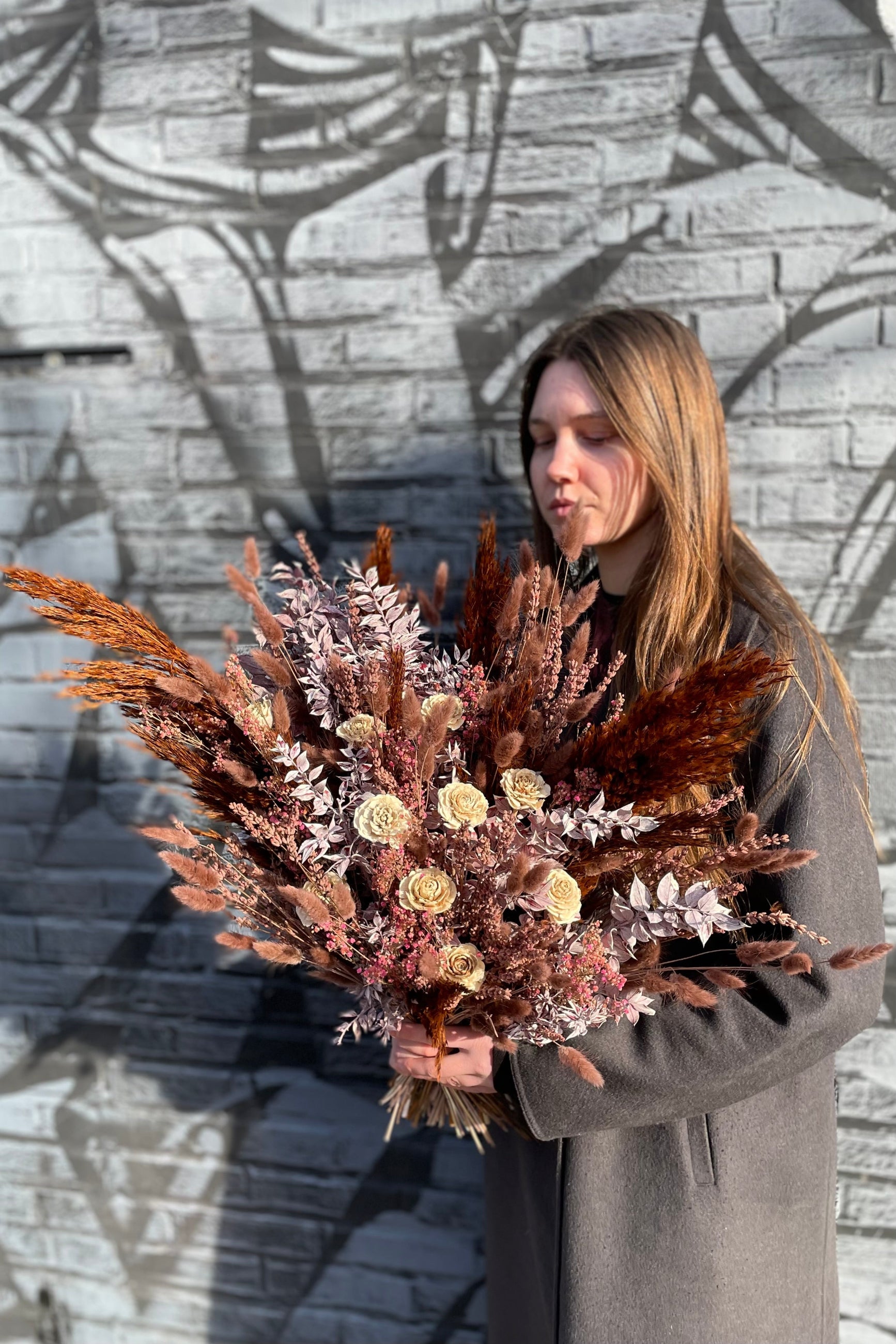Preserved and colored plumes, lagers, cuscus and broom within the Sprout Home 'Ambrosia' arrangement ©Sprout Home #size_$200