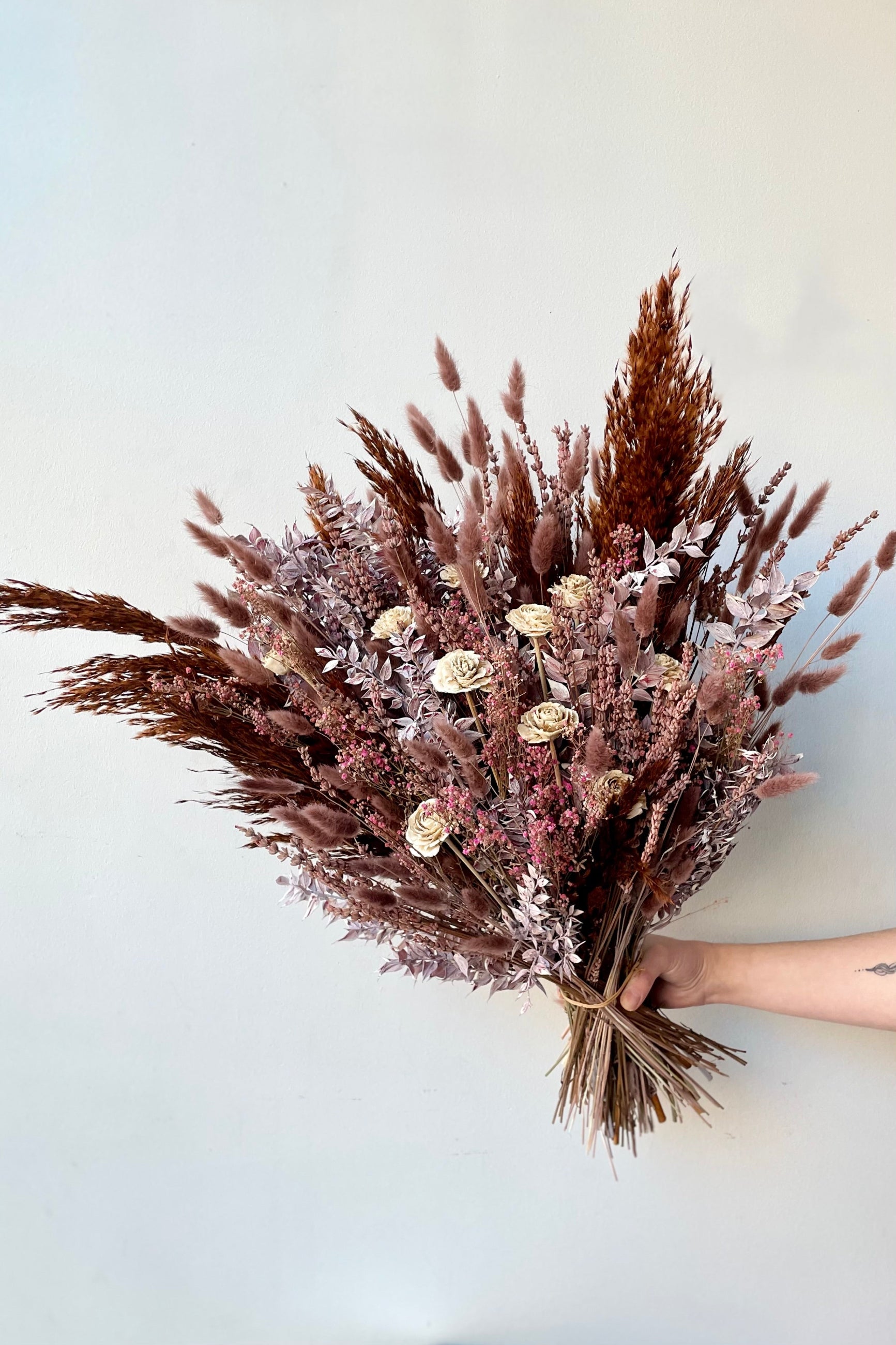 Shades of brown, mauve and cream in the unique and custom dried floral arrangement "Ambrosia" ©Sprout Home #size_$200