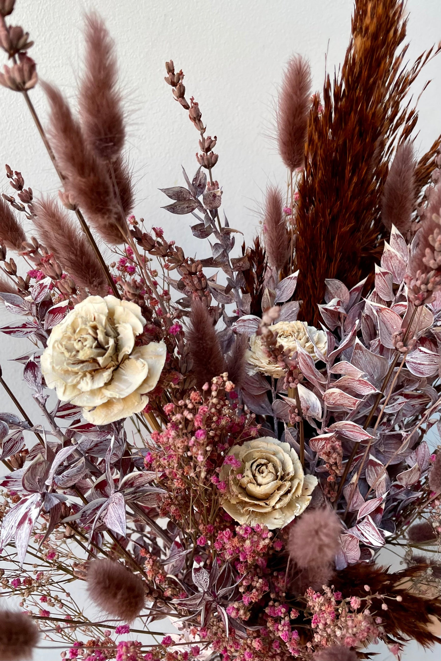 Detail of Sprout Home's Ambrosia preserved arrangement showing the detailed mauve flowers. ©Sprout Home #size_$85