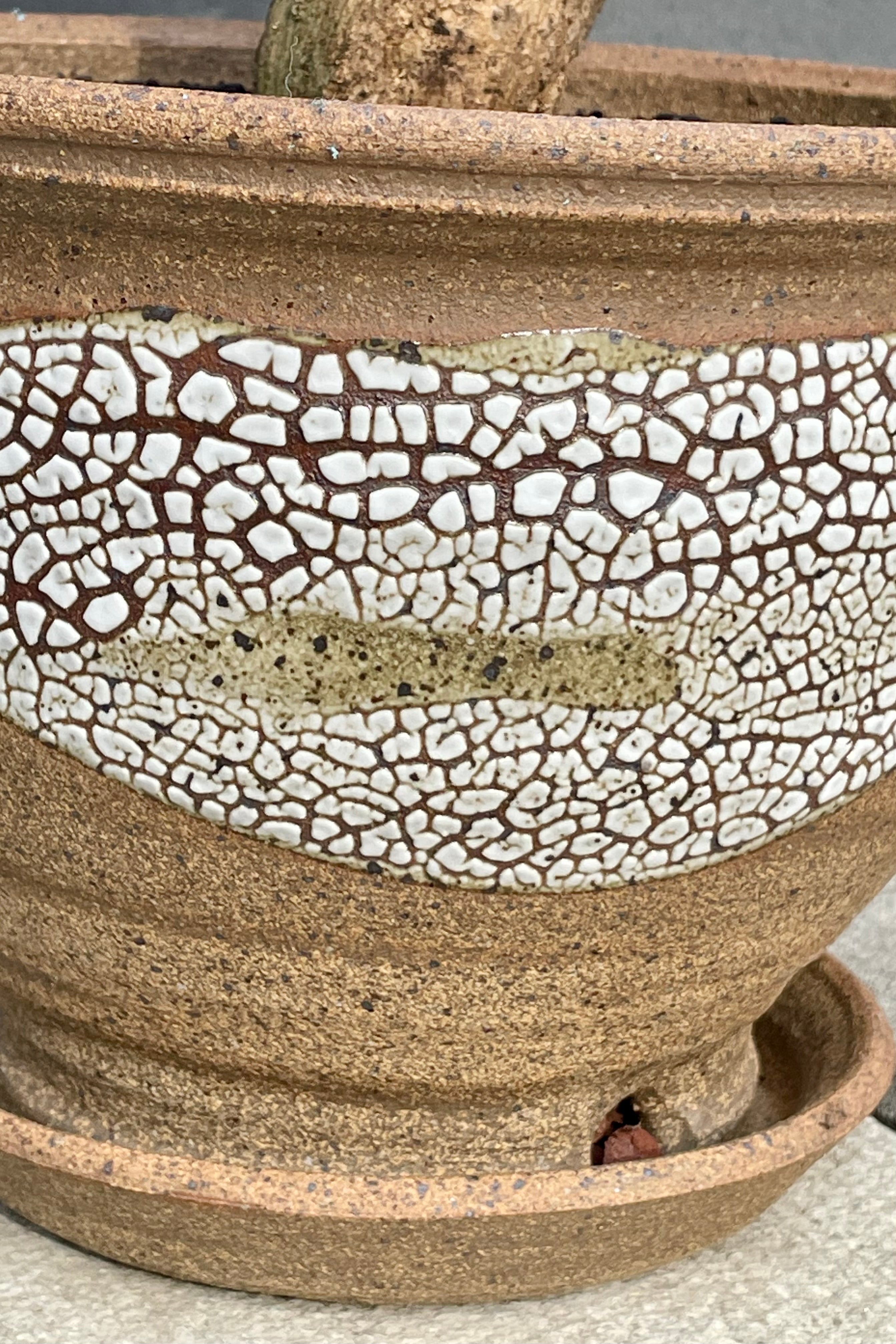 Detail photo of natural glaze of Super Crackle Planter with drainage.