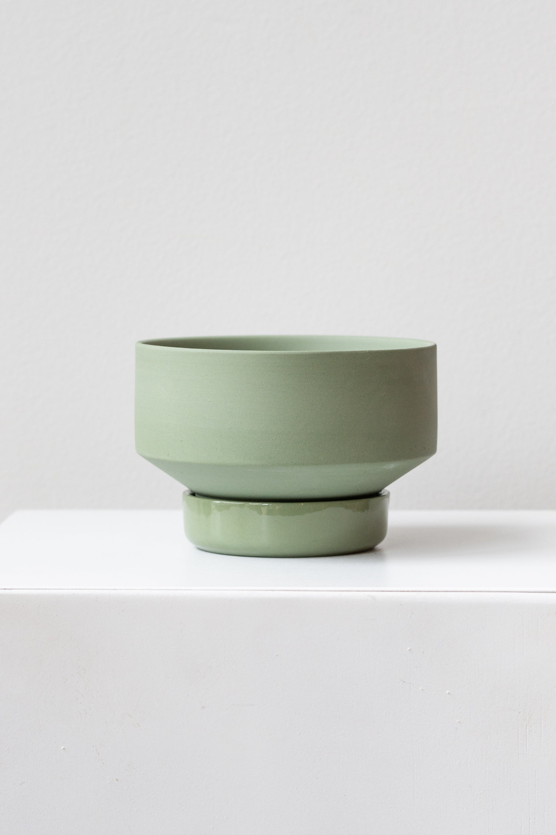 Angus & Celeste Collector's Gro pot olive small on white surface in front of white background