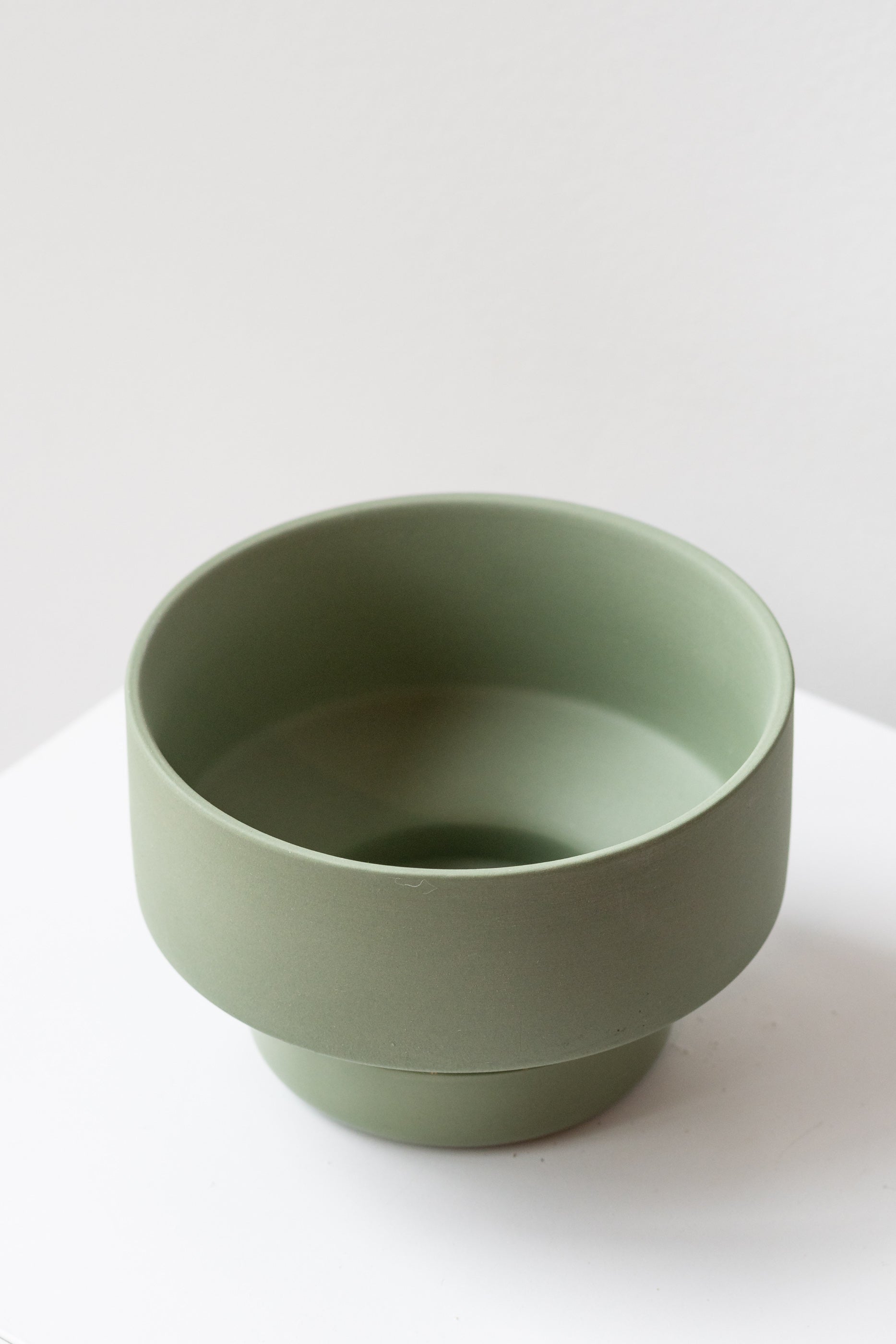 Angus & Celeste Collector's Gro pot olive small on white surface in front of white background