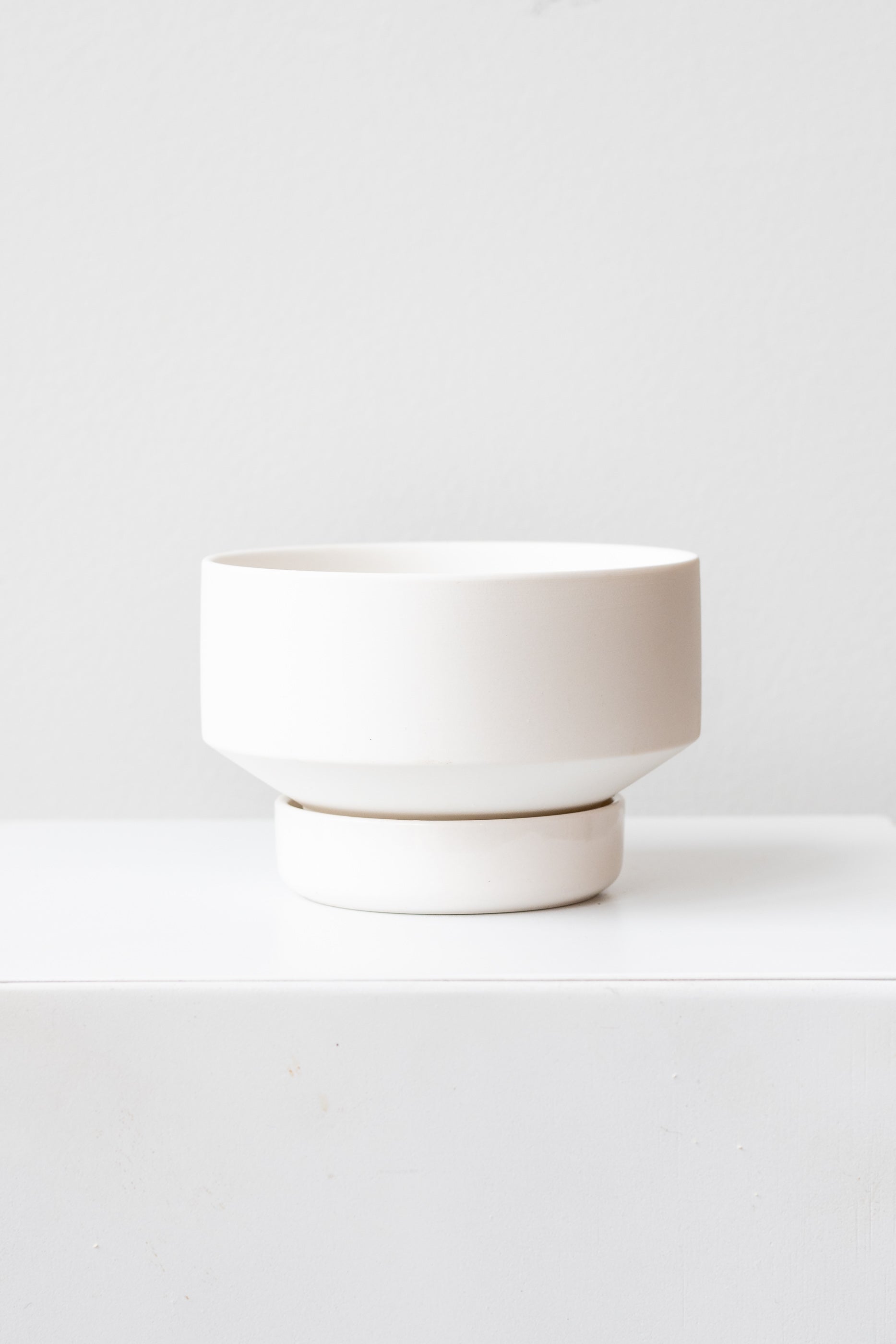 Angus & Celeste Collector's Gro pot white small on white surface in front of white background
