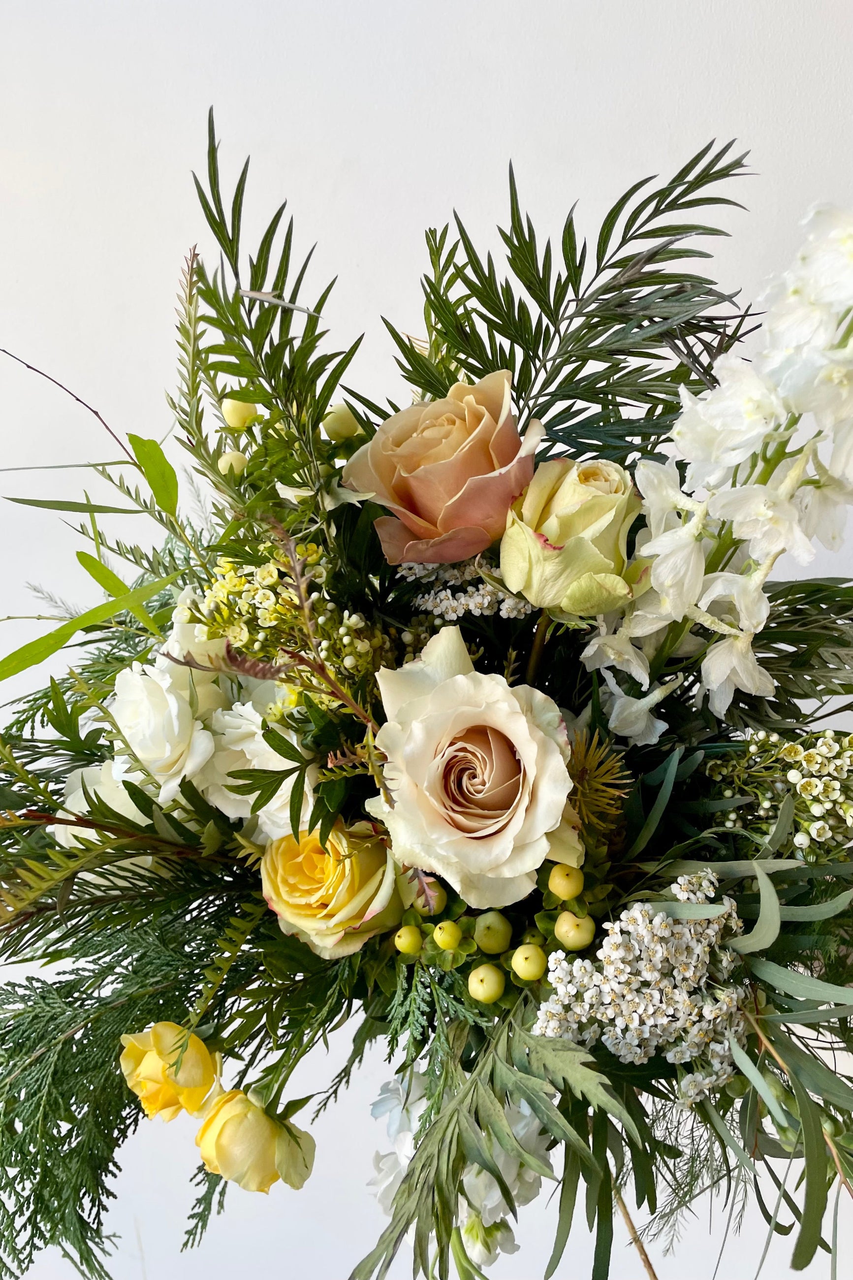 A detail view of fresh Floral Arrangement Eggnog with light yellows in winter from Sprout Home Floral in Chicago ©Sprout Home. #size_$160
