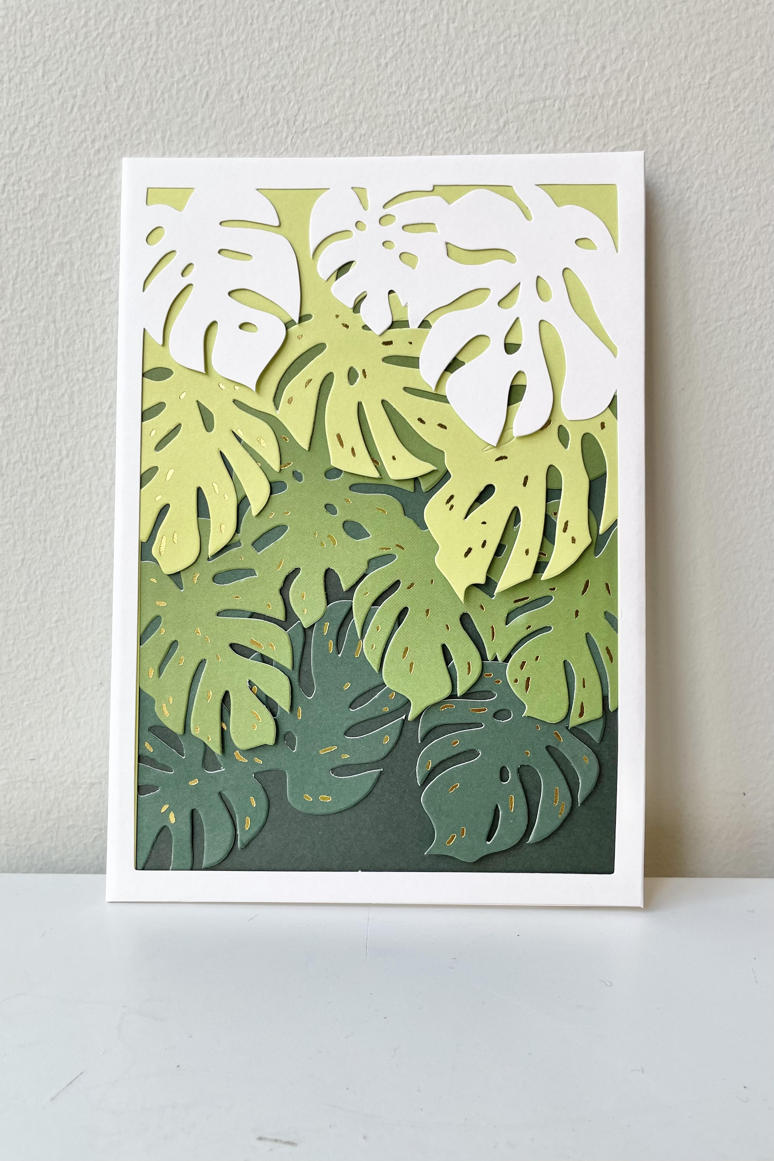 The Monstera Laser-cut Card sits against a white backdrop.