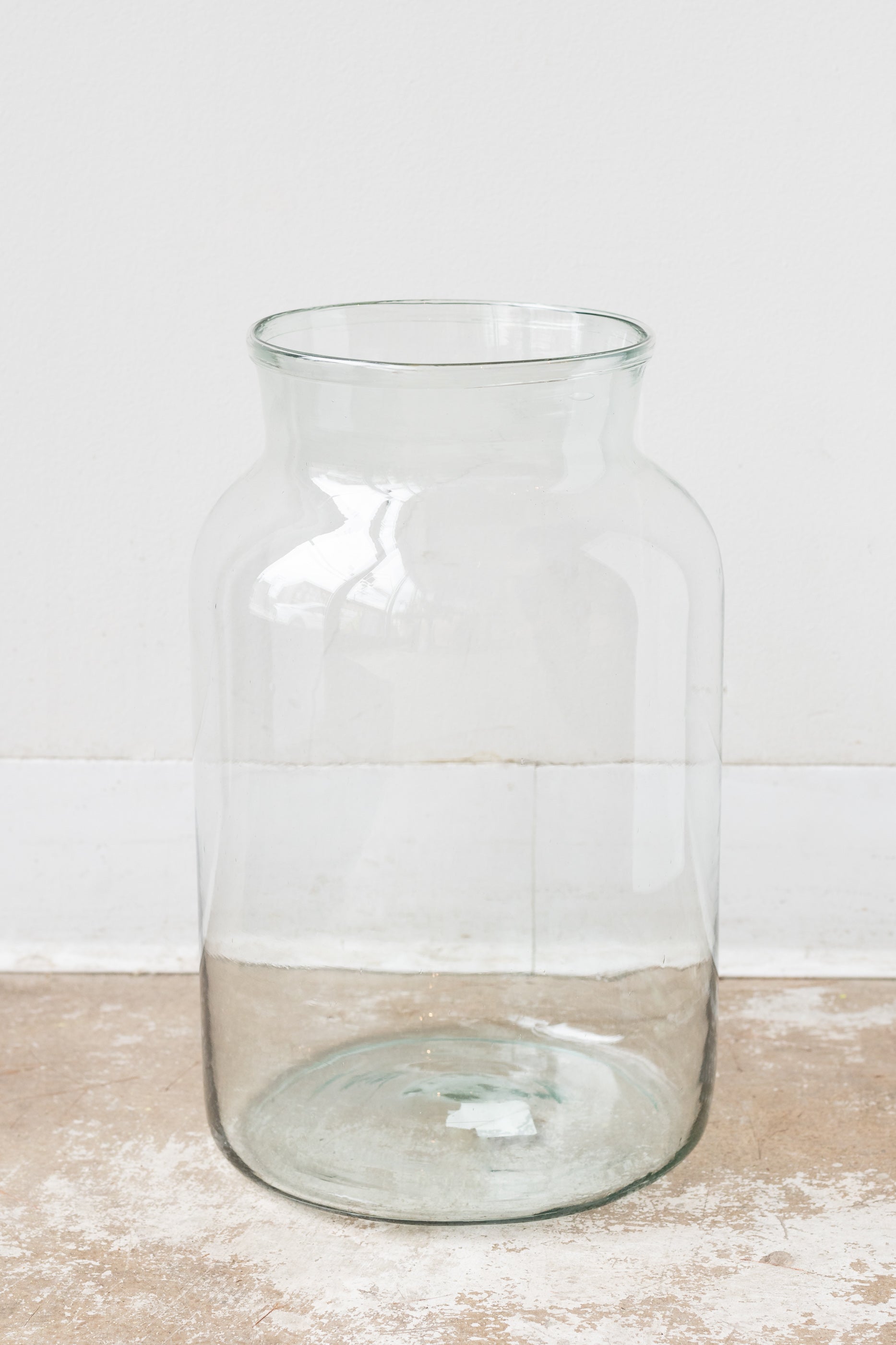 Recycled glass oversized mason jar in front of white background