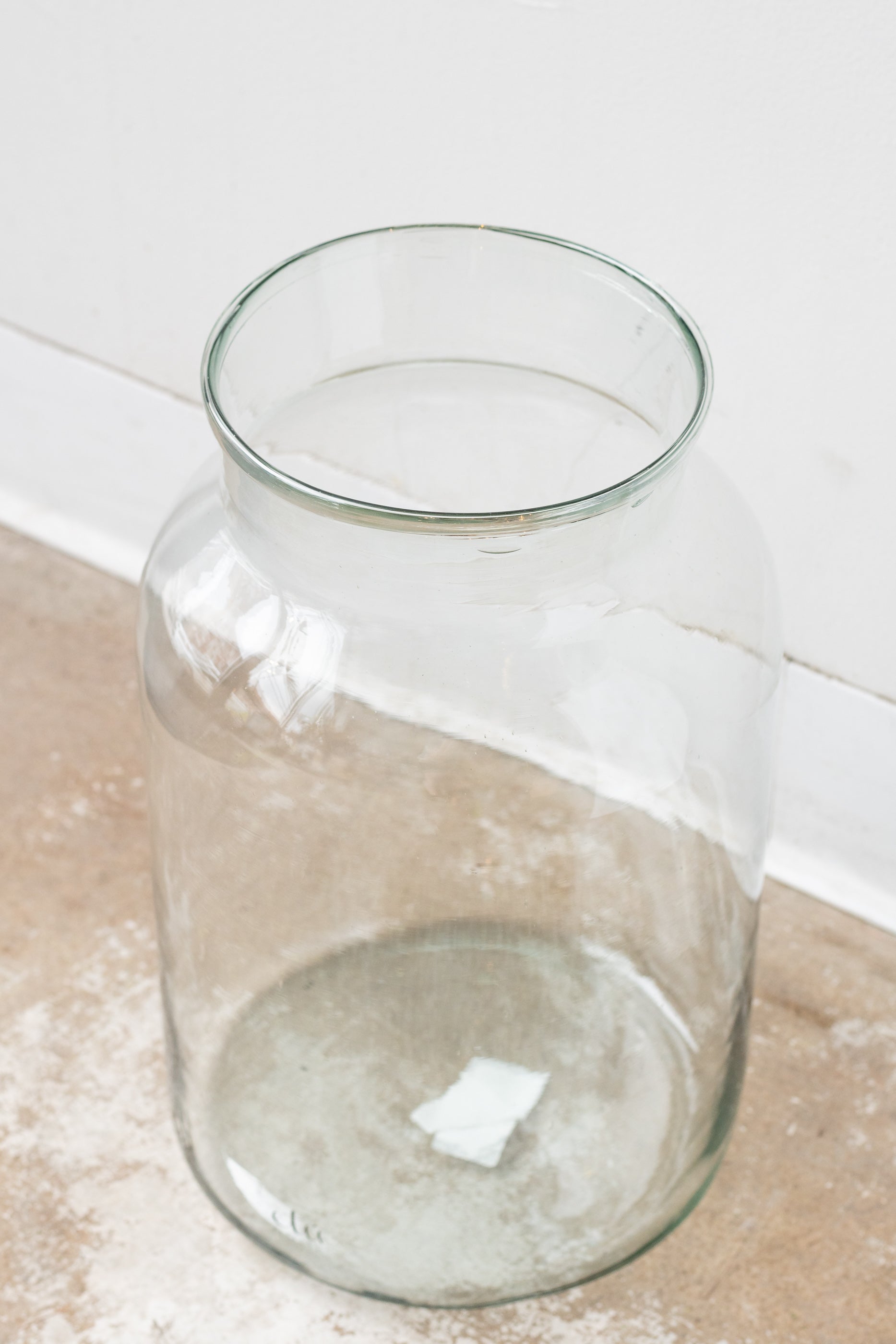 Recycled glass oversized mason jar in front of white background