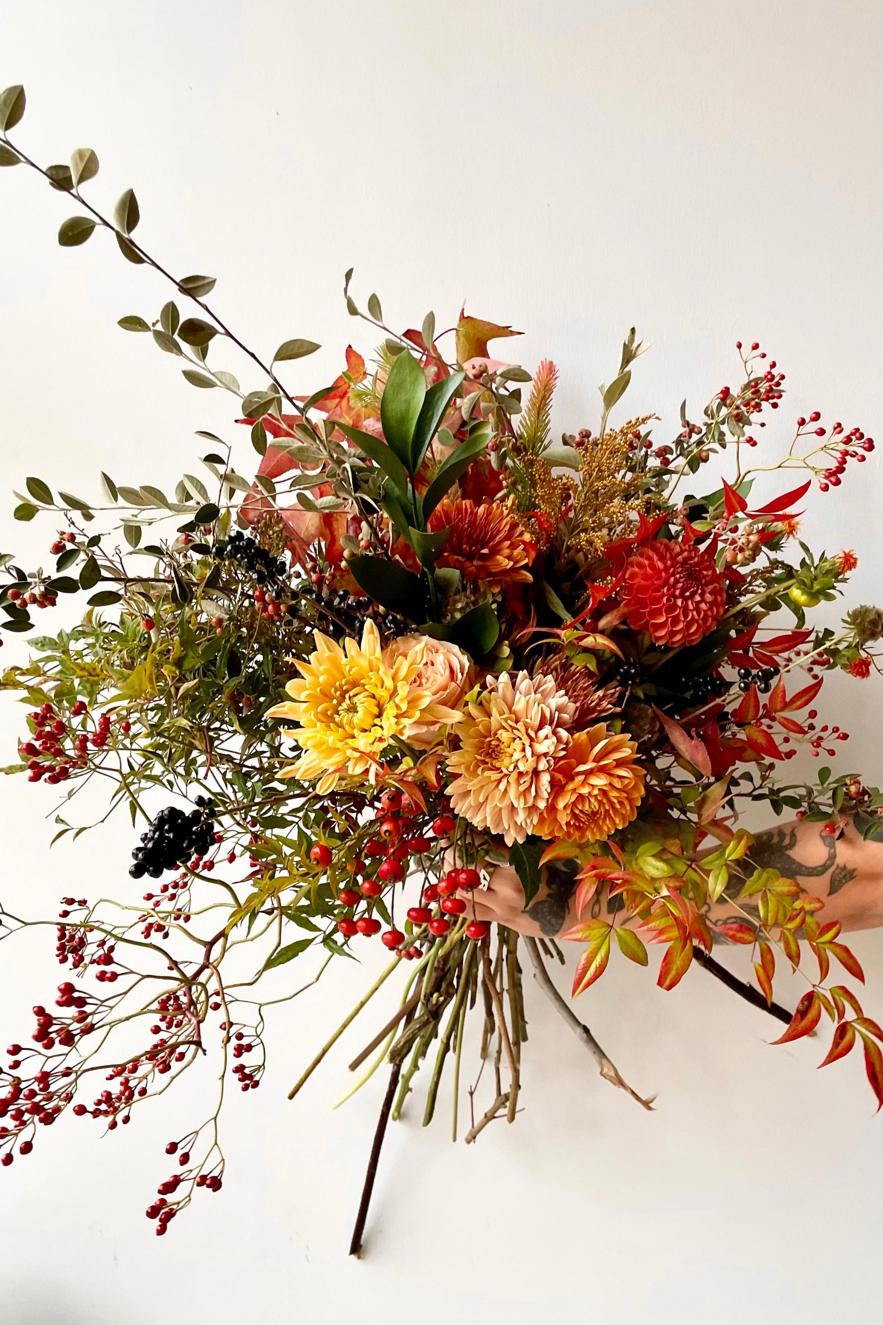 'Harvest Moon' arrangement filled with fall foliage and fluffy flower heads by Sprout Home available for delivery in chicago or pick up. Fall colors abound!!! ©Sprout Home #size_$200