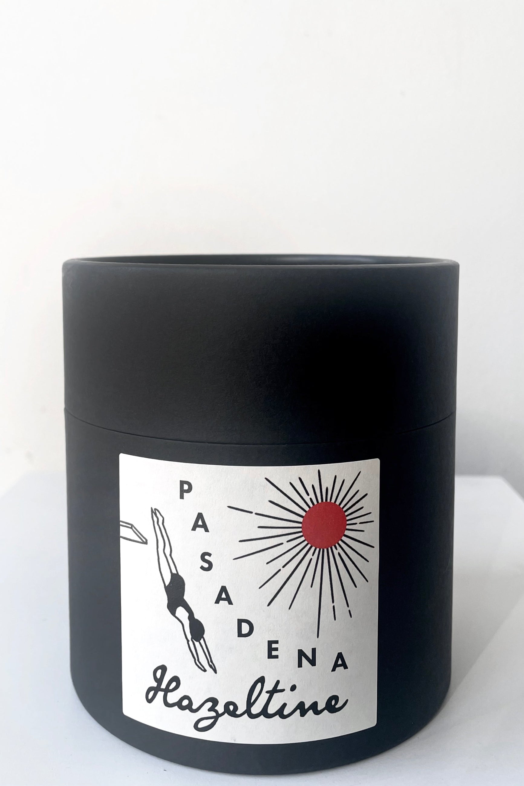 A full view of the packaging of Hazeltine Candle pasadena against white backdrop ©Sprout Home
