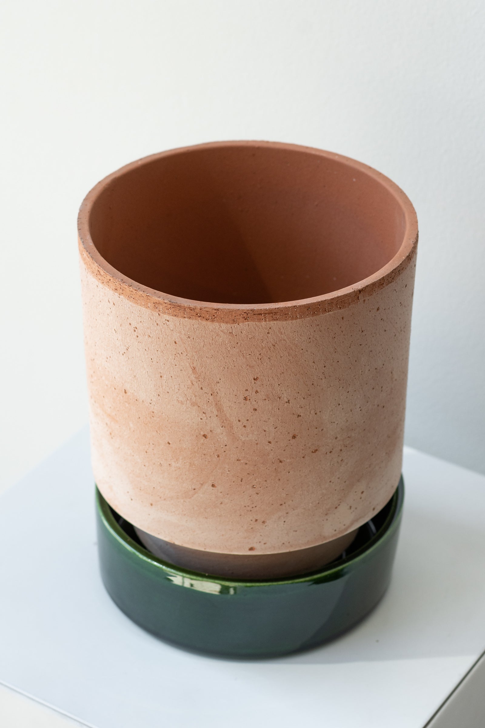Rosa and emerald 5.5 inch Hoff Pot by Bergs Potter on a white surface in a white room ©Sprout Home