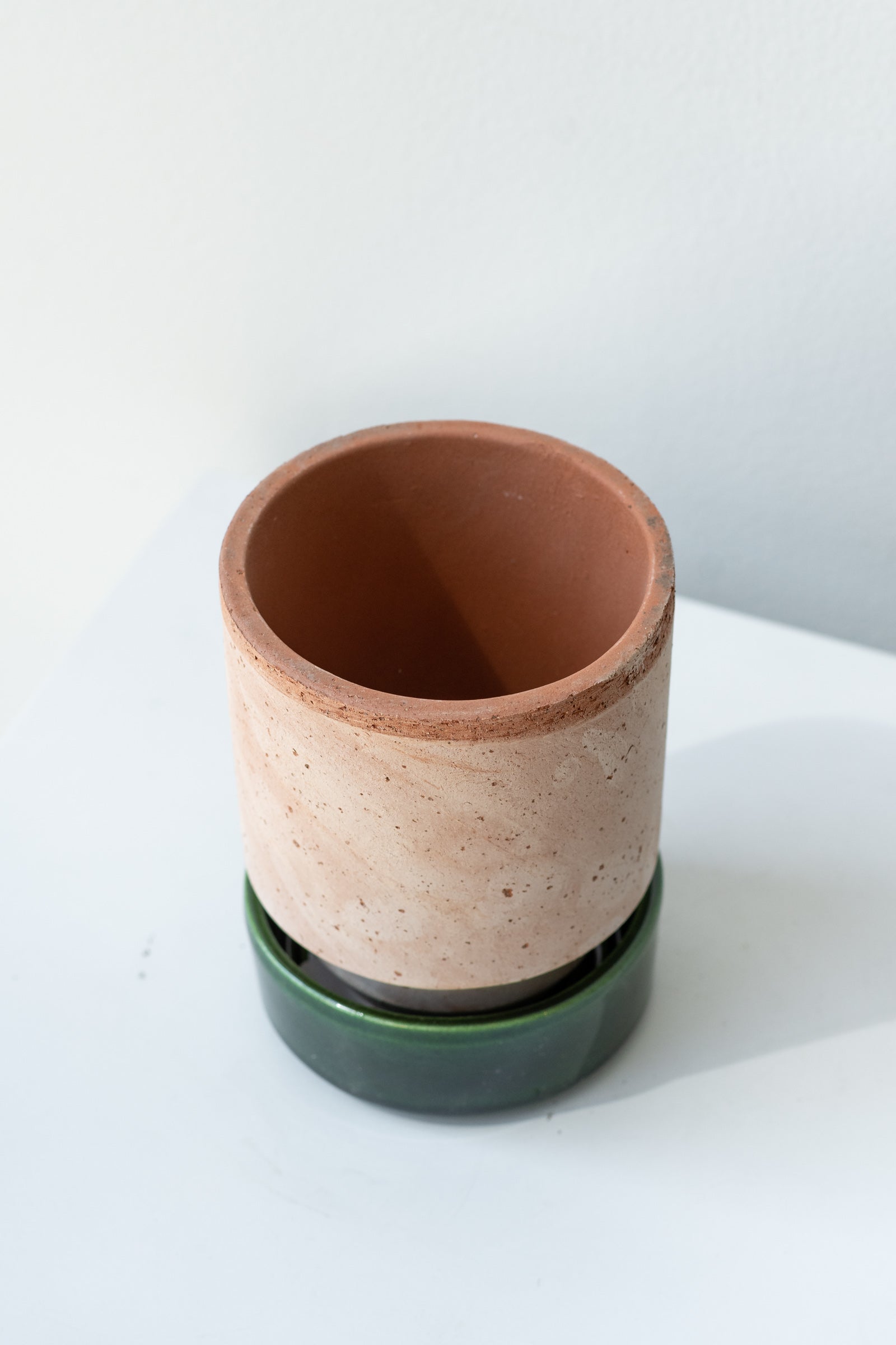 Rosa and emerald 3.1 inch Hoff Pot by Bergs Potter on a white surface in a white room ©Sprout HOme
