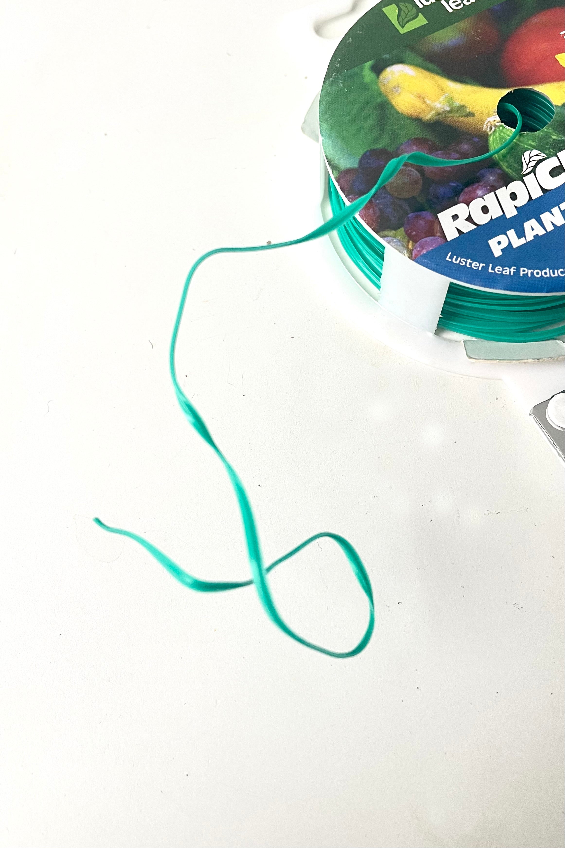A detailed view of the Luster Leaf Plant Twist Tie against white backdrop